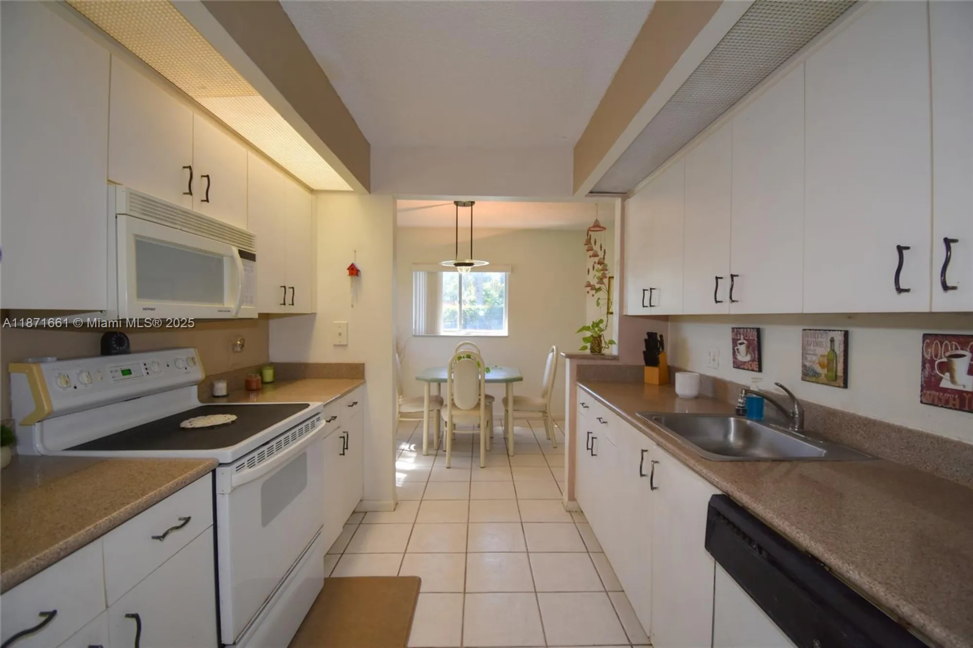 Property Slideshow image 7 of 25 | 13455 sw 16th ct f114, Pembroke Pines, FL, 33027