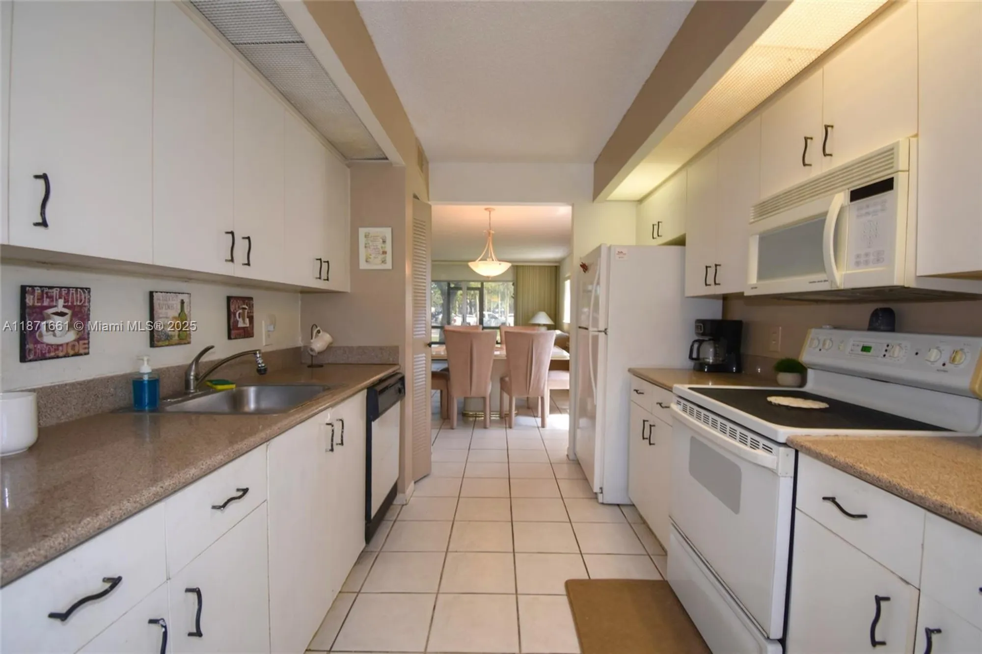 Property Slideshow image 8 of 25 | 13455 sw 16th ct f114, Pembroke Pines, FL, 33027