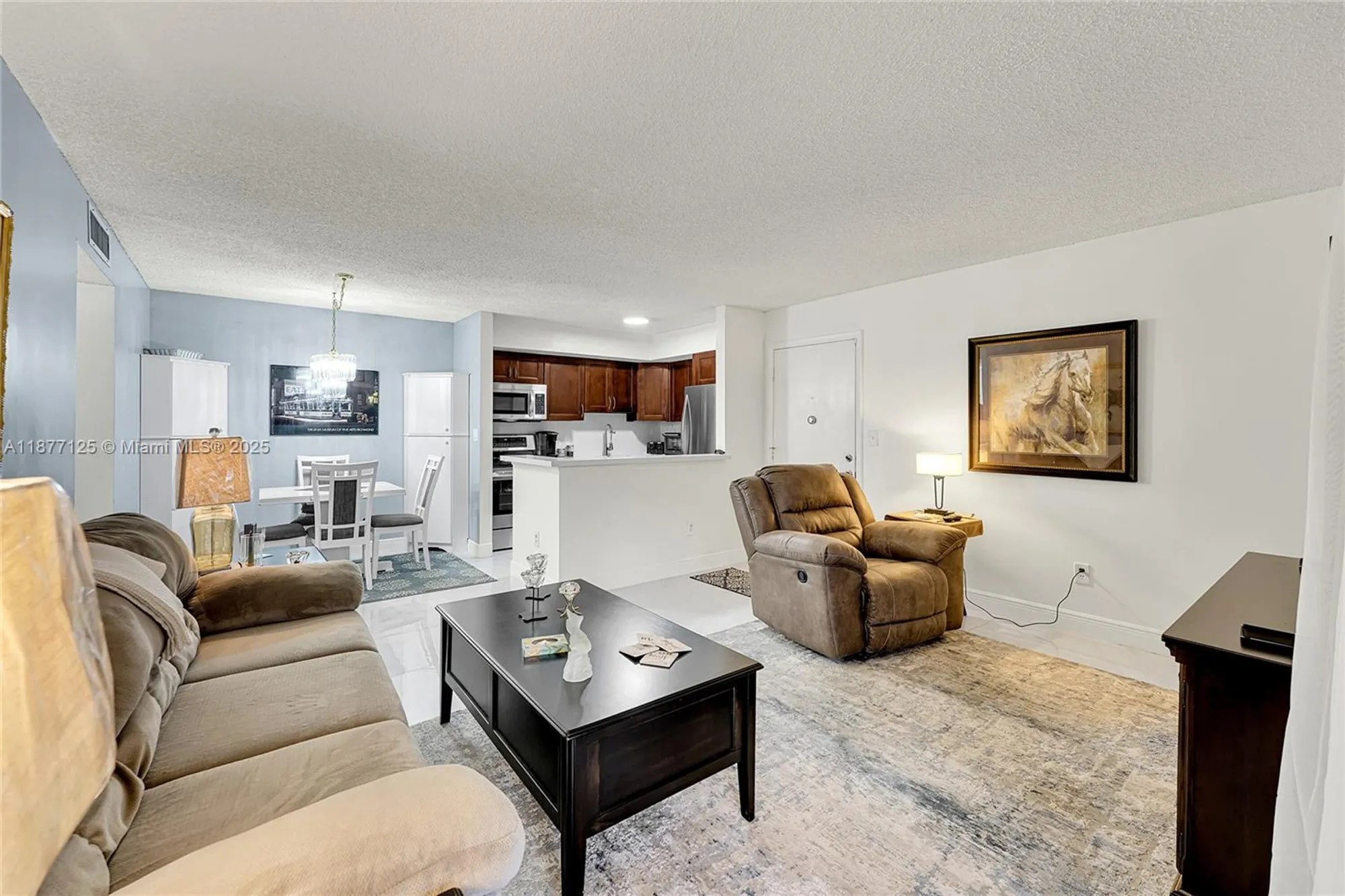 Property Slideshow image 12 of 23 | 10401 e clairmont cir # 109, Tamarac, FL, 33321