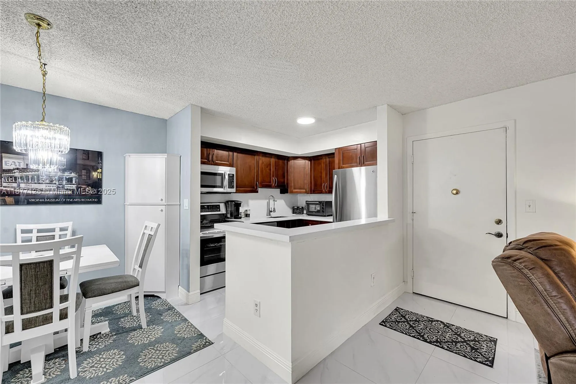 Property Slideshow image 5 of 23 | 10401 e clairmont cir # 109, Tamarac, FL, 33321