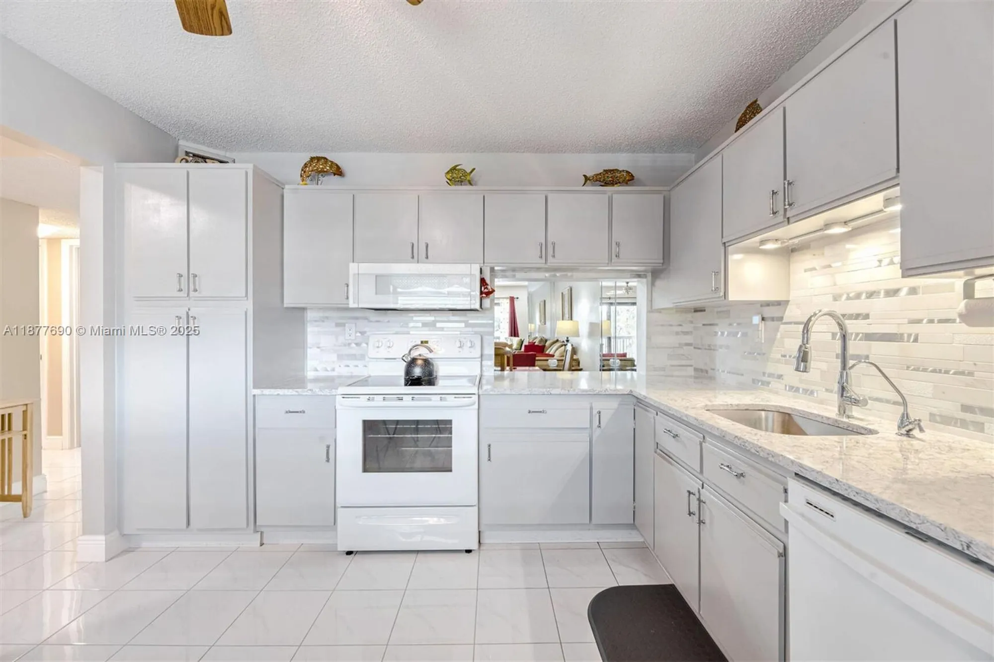 Property Slideshow image 1 of 30 | 4955 e sabal palm blvd apt 305, Tamarac, FL, 33319