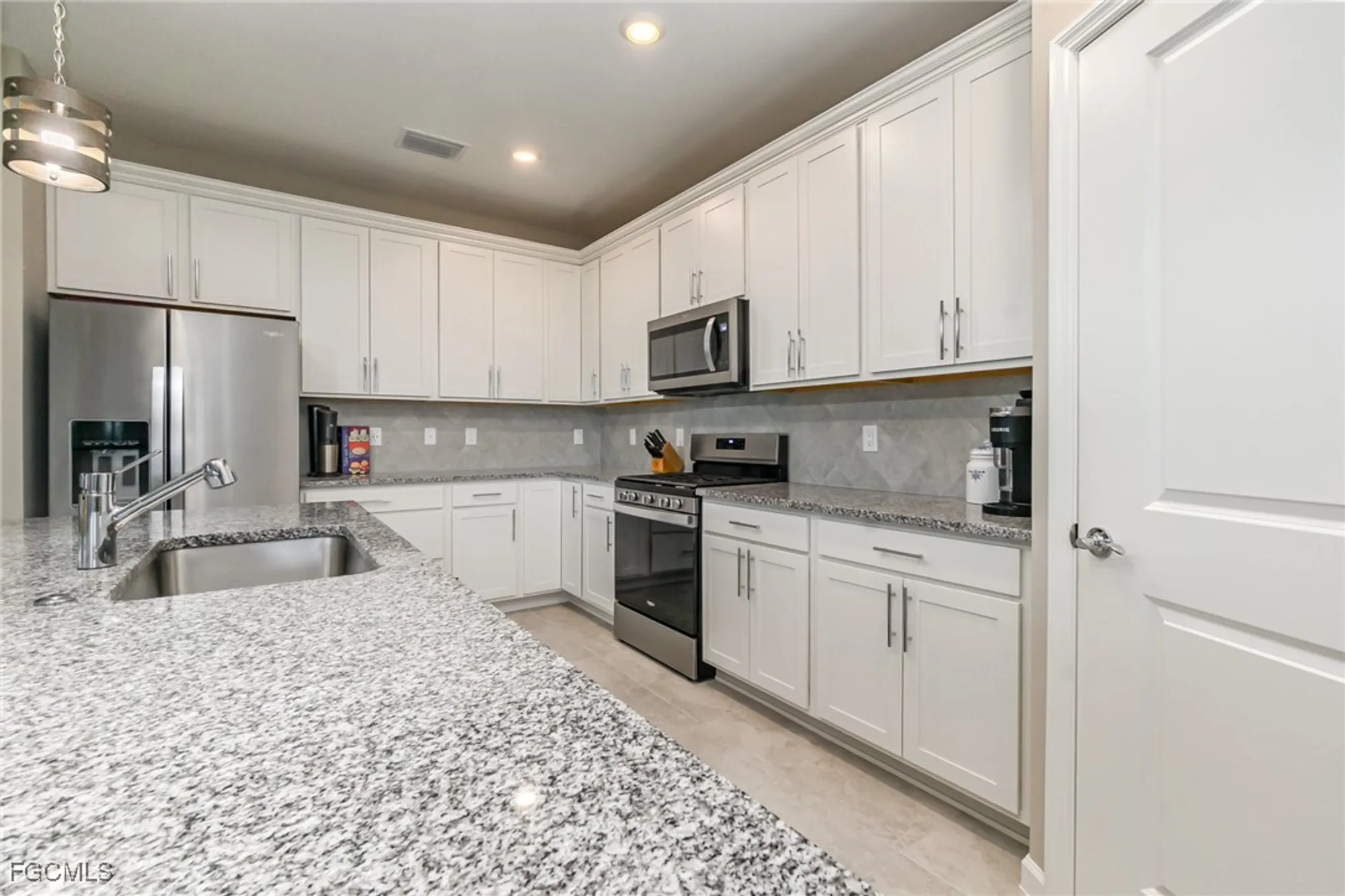 Property Slideshow image 10 of 42 | 7079 chapel creek ln, North Fort Myers, FL, 33917