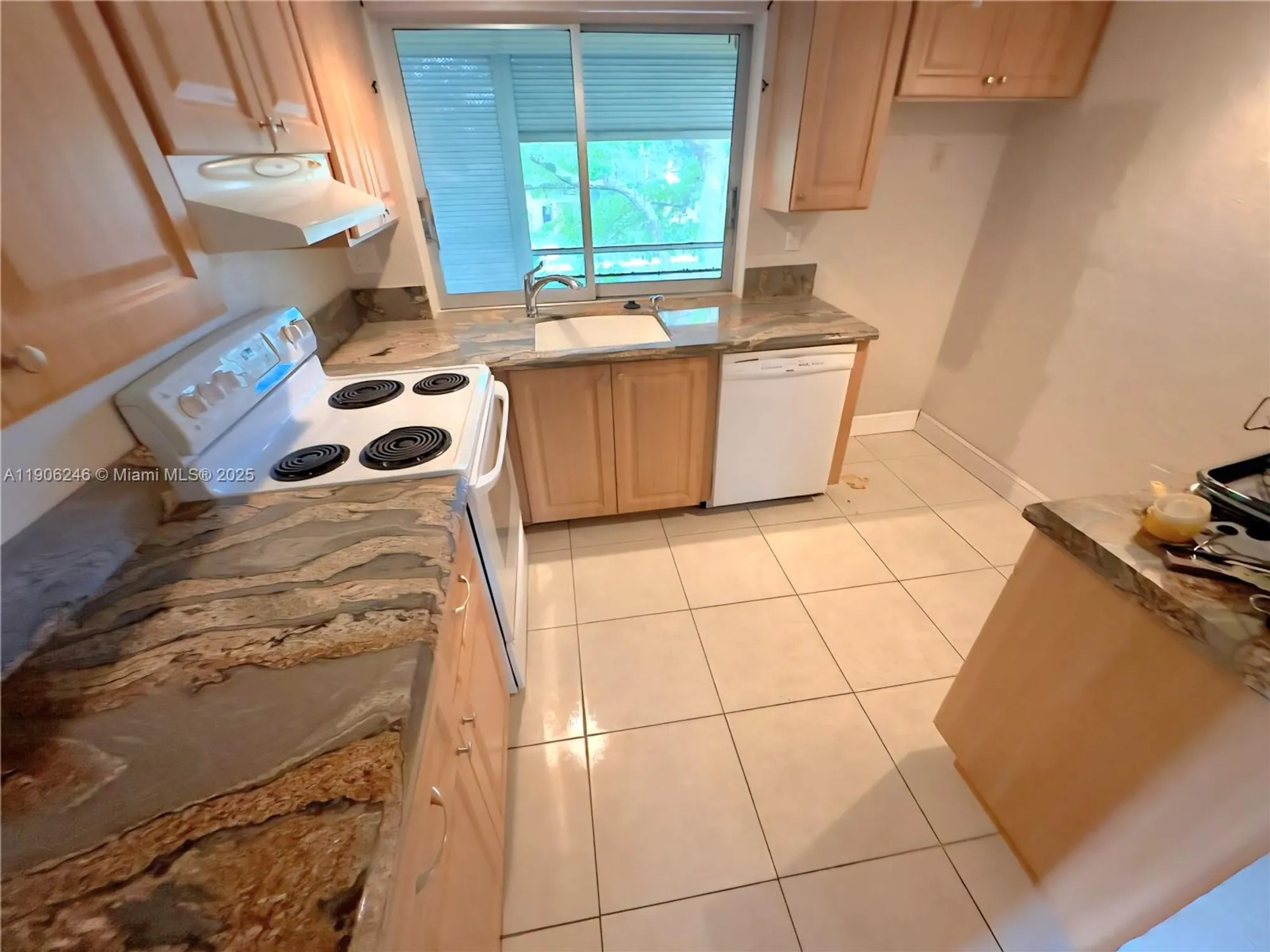 Property Slideshow image 6 of 31 | 9070 lime bay blvd 301, Tamarac, FL, 33321