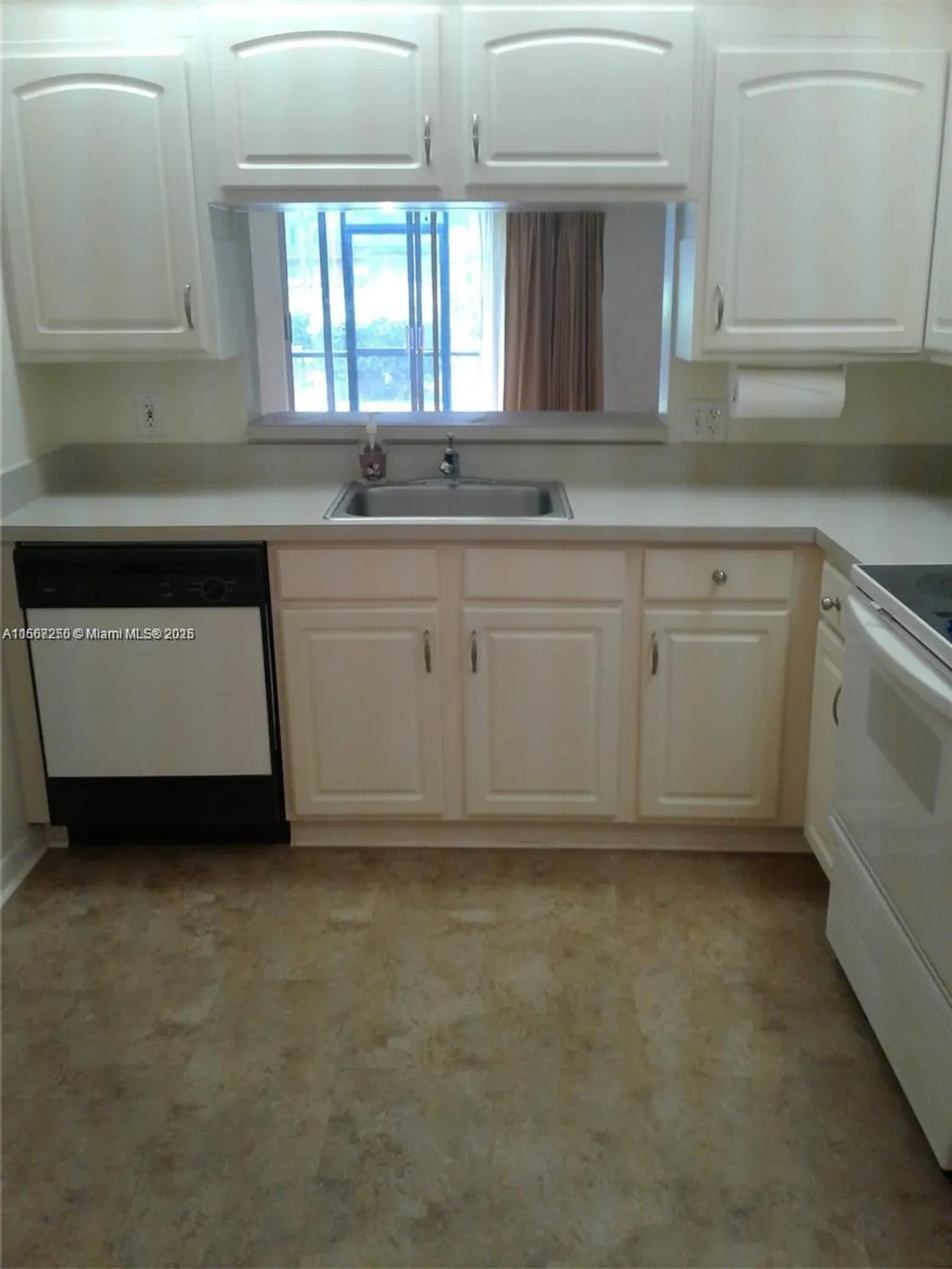 Property Slideshow image 1 of 30 | 701 sw 142nd ave 104s, Pembroke Pines, FL, 33027