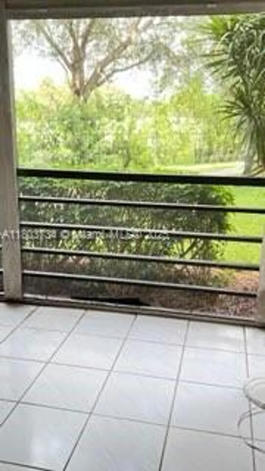 Property Slideshow image 12 of 26 | 1400 saint charles pl l4, Pembroke Pines, FL, 33026