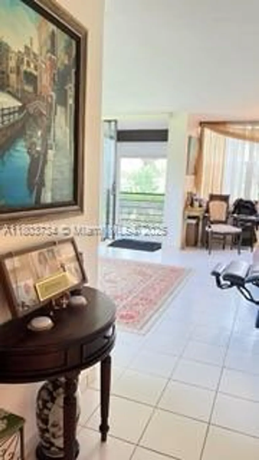 Property Slideshow image 7 of 26 | 1400 saint charles pl l4, Pembroke Pines, FL, 33026
