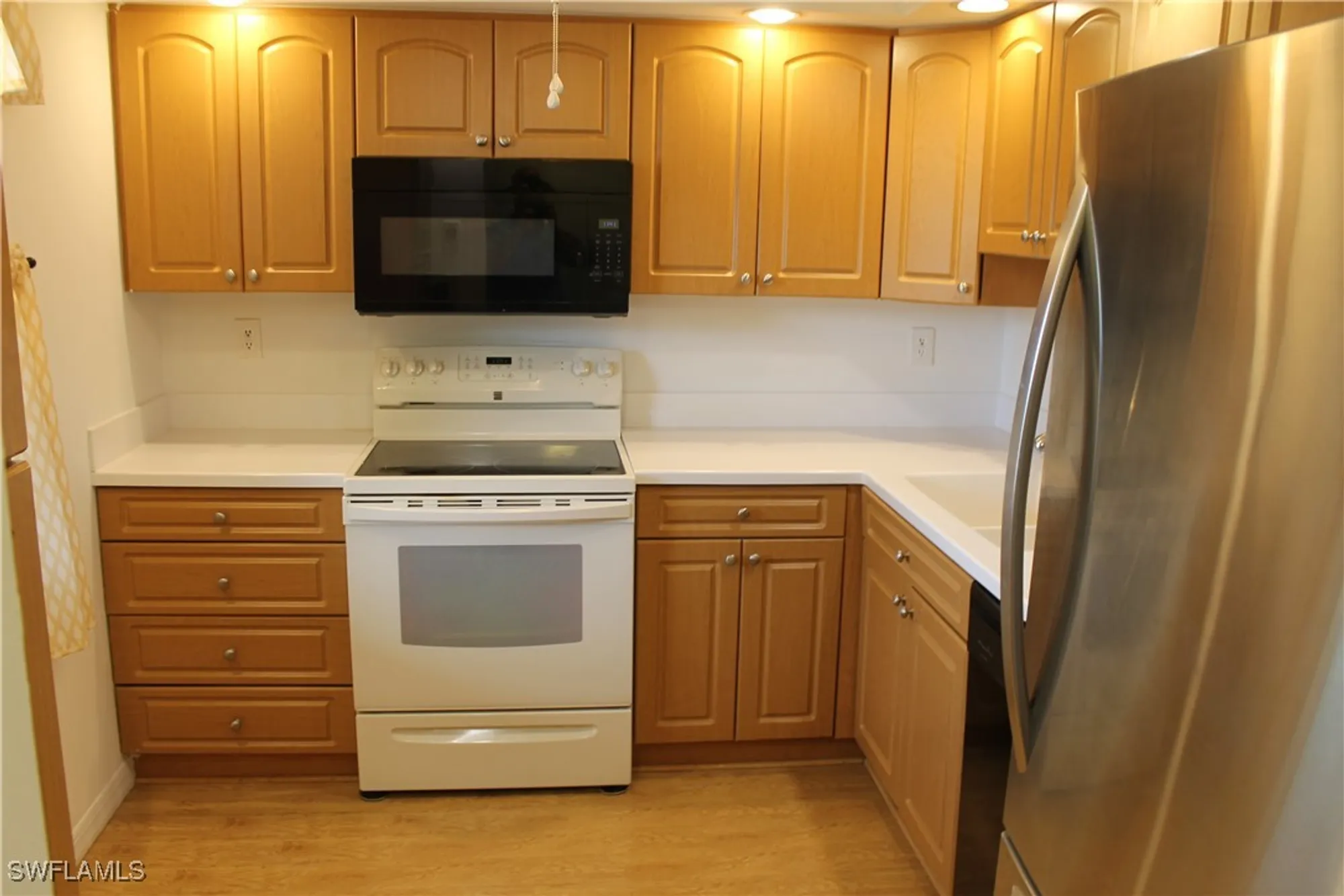 Property Slideshow image 4 of 50 | 1828 pine valley dr 310, Fort Myers, FL, 33907