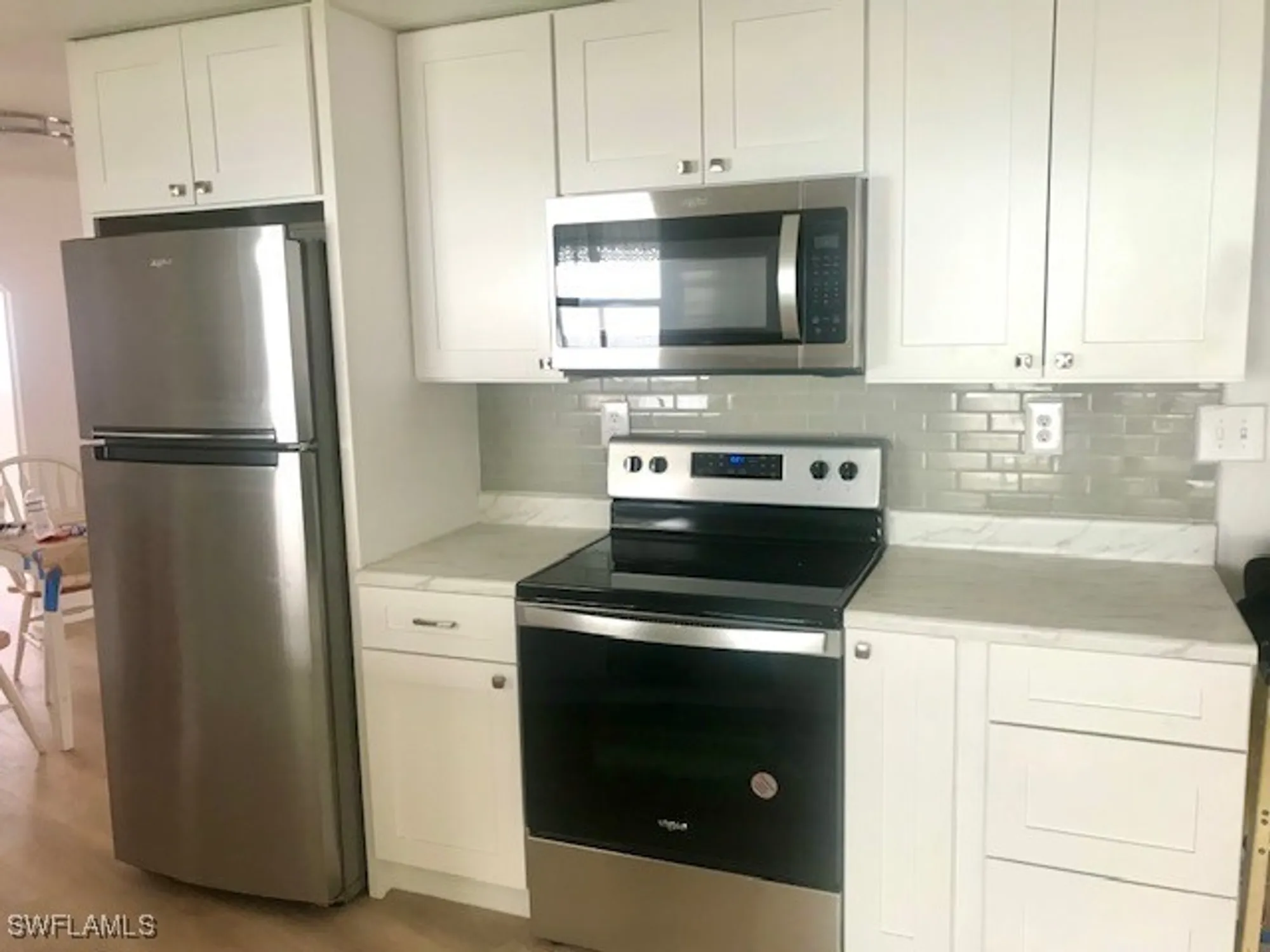 Property Slideshow image 4 of 40 | 14591 paul revere loop, North Fort Myers, FL, 33917