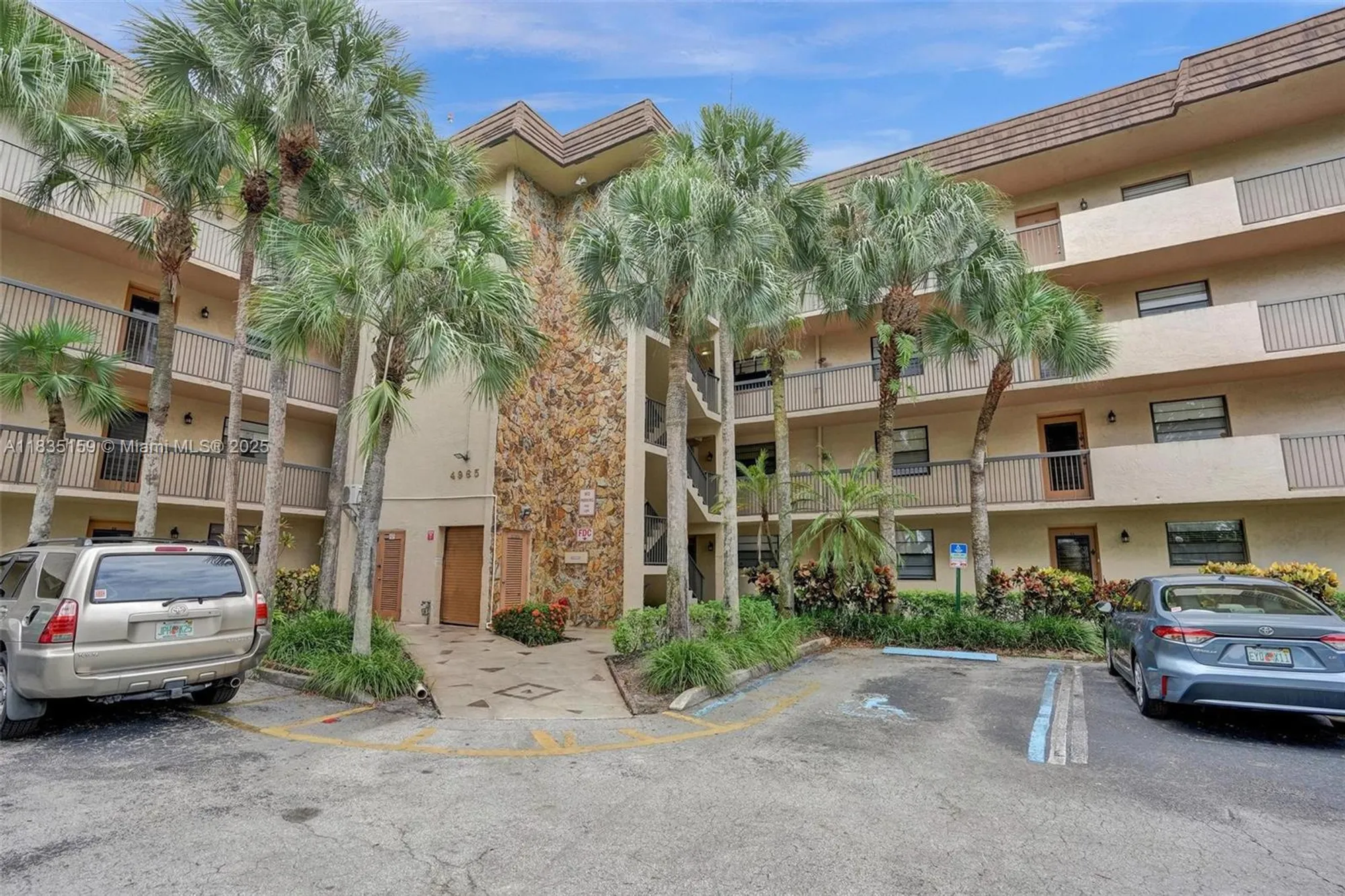 Property Slideshow image 1 of 37 | 4965 e sabal palm blvd 207, Tamarac, FL, 33319