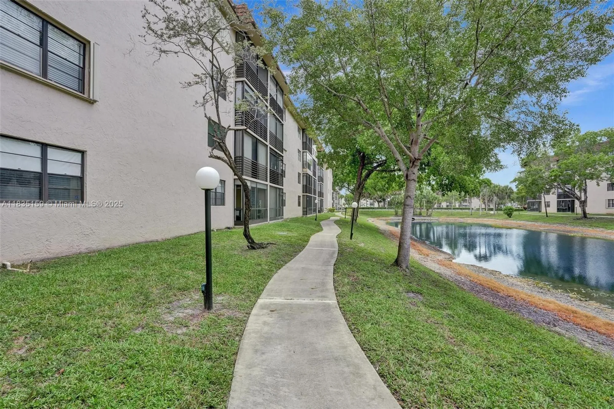 Property Slideshow image 34 of 37 | 4965 e sabal palm blvd 207, Tamarac, FL, 33319