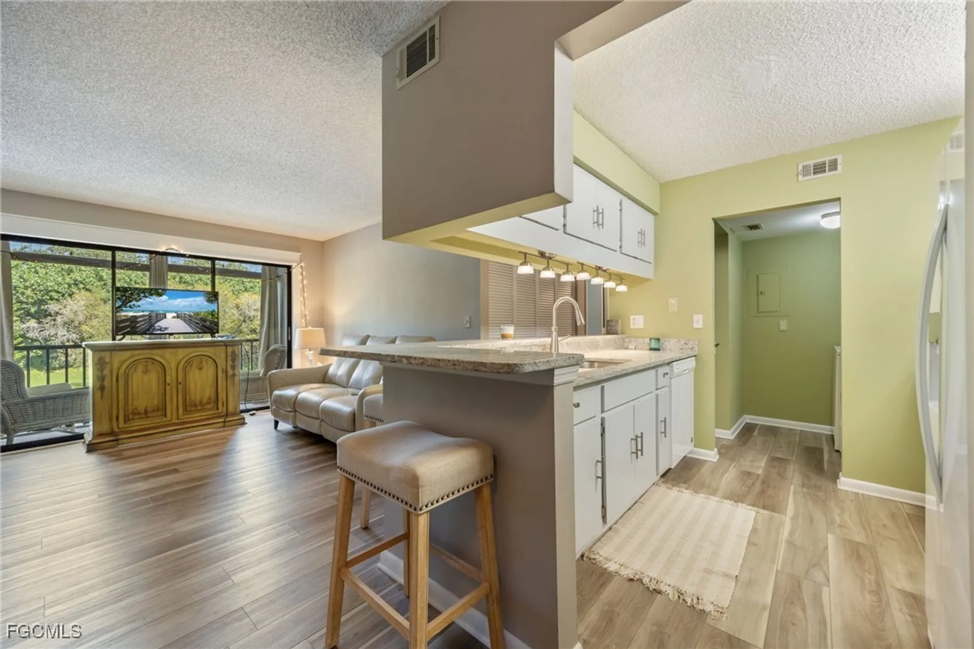 Property Slideshow image 9 of 50 | 9540 green cypress ln 11, Fort Myers, FL, 33905