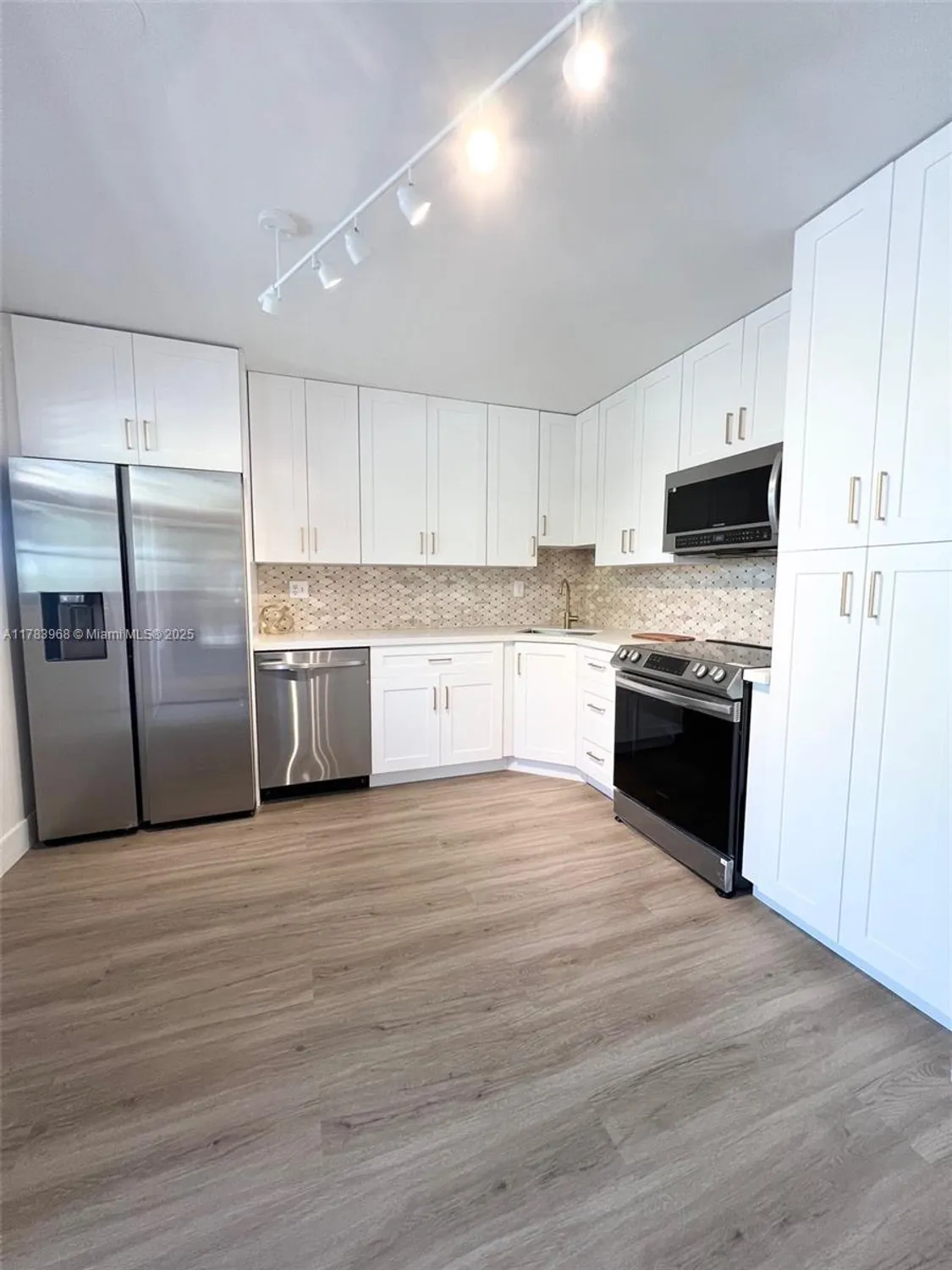 Property Slideshow image 1 of 20 | 6085 n sabal palm blvd 308, Tamarac, FL, 33319