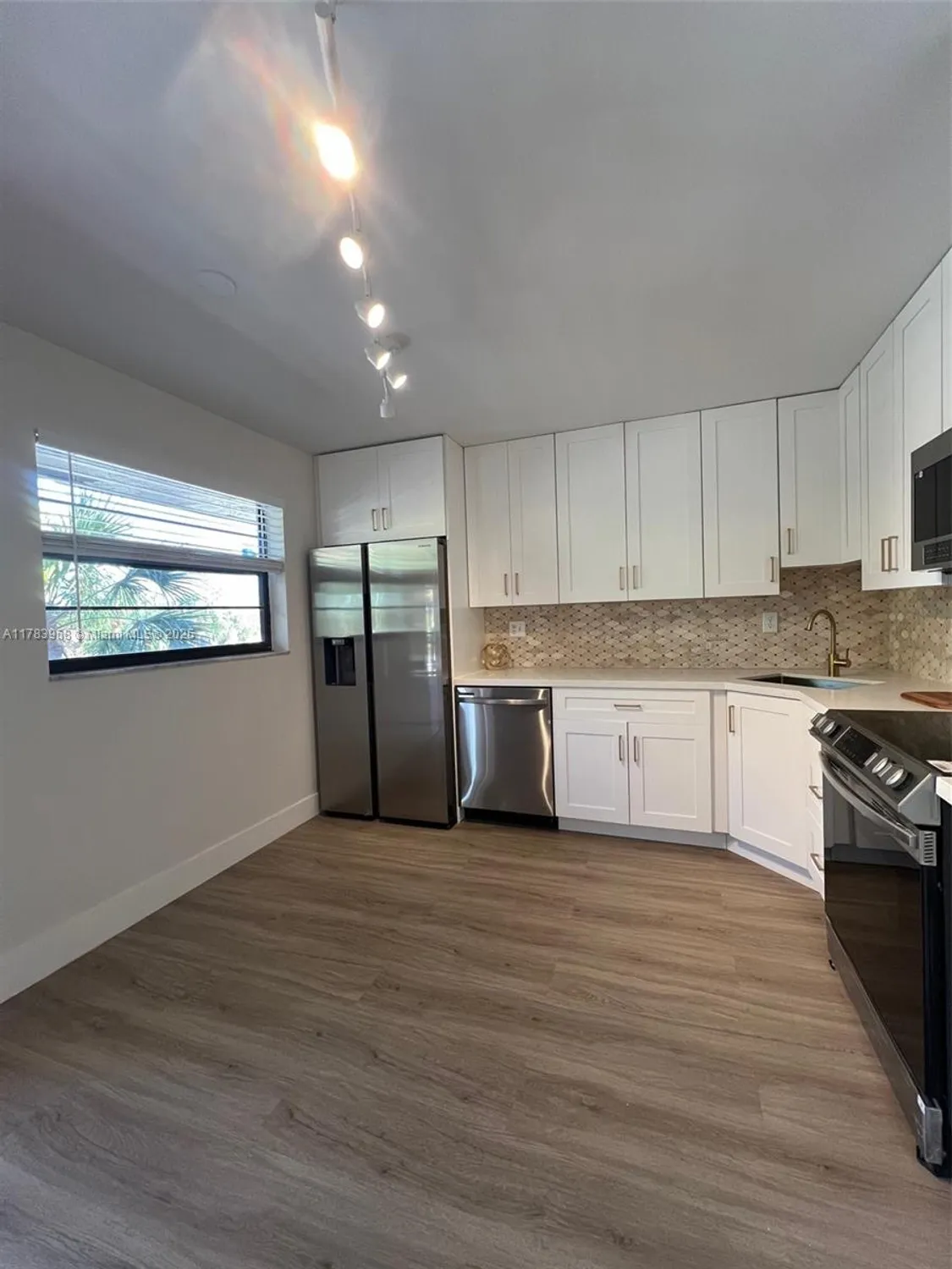 Property Slideshow image 3 of 20 | 6085 n sabal palm blvd 308, Tamarac, FL, 33319