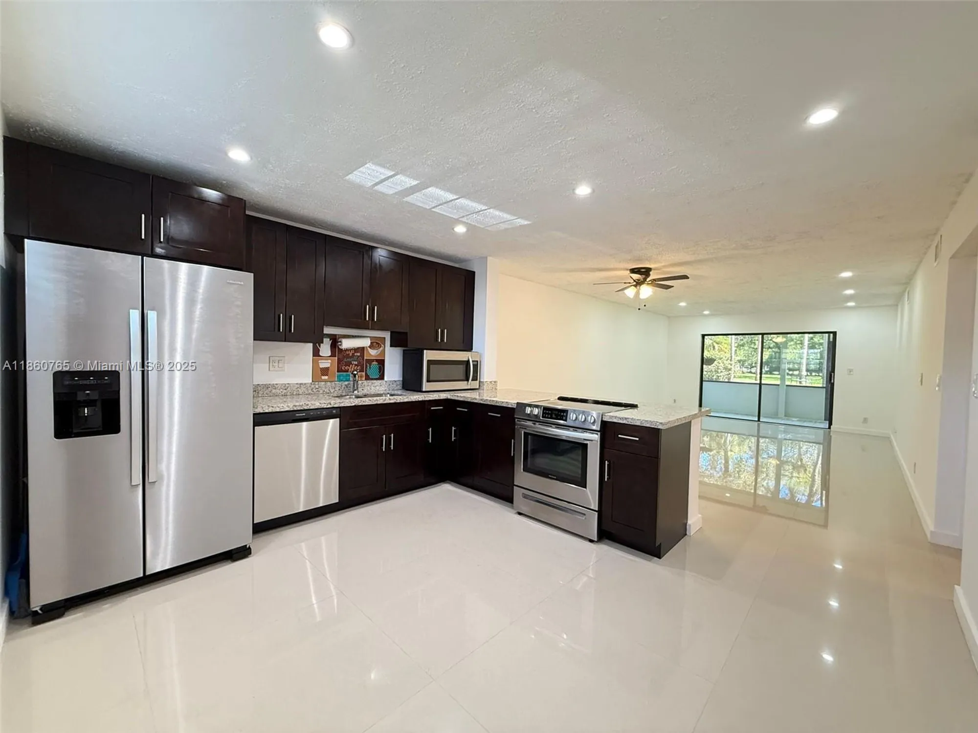 Property Slideshow image 1 of 34 | 6095 n sabal palm blvd apt 103, Tamarac, FL, 33319
