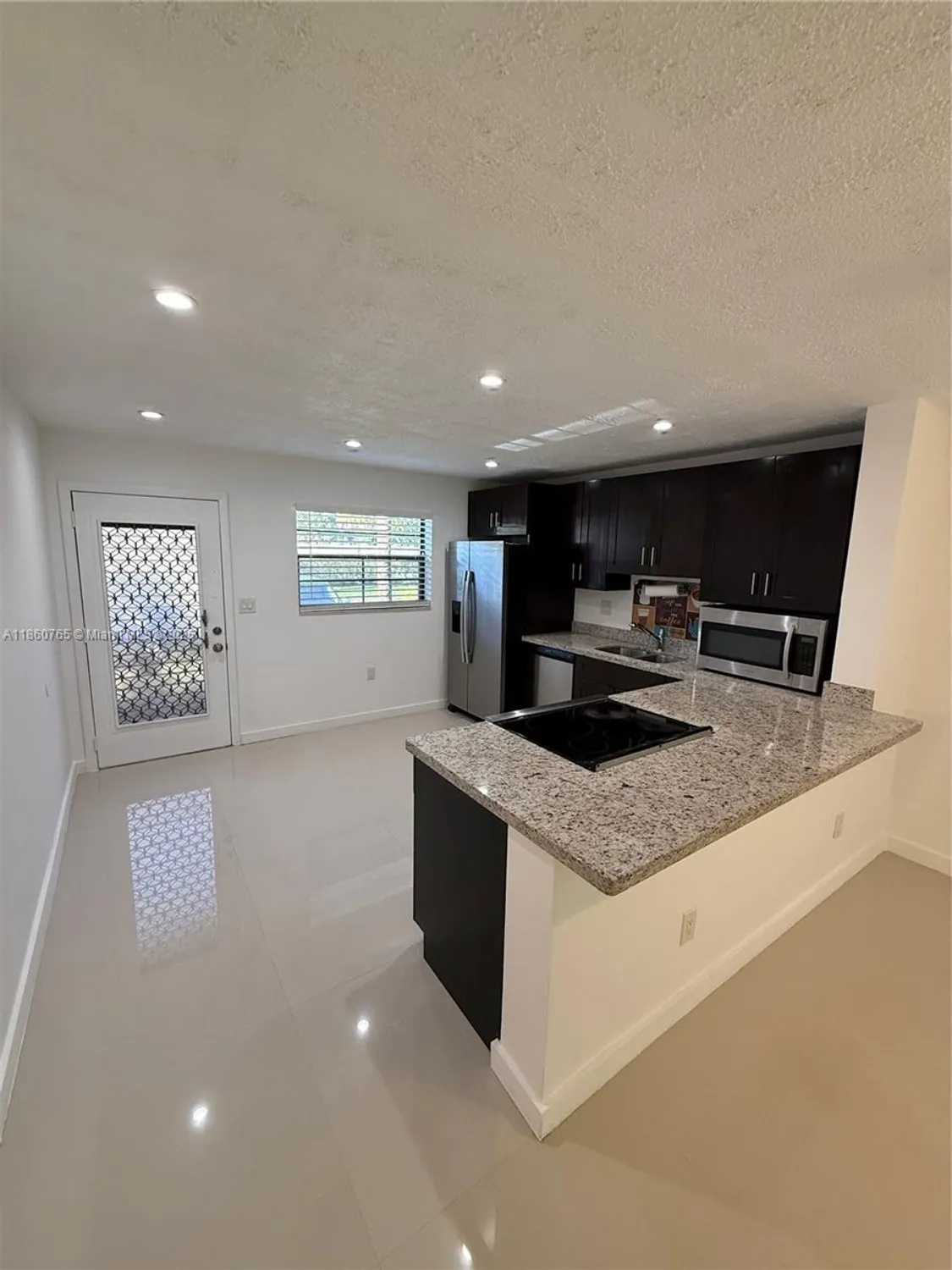 Property Slideshow image 6 of 34 | 6095 n sabal palm blvd apt 103, Tamarac, FL, 33319