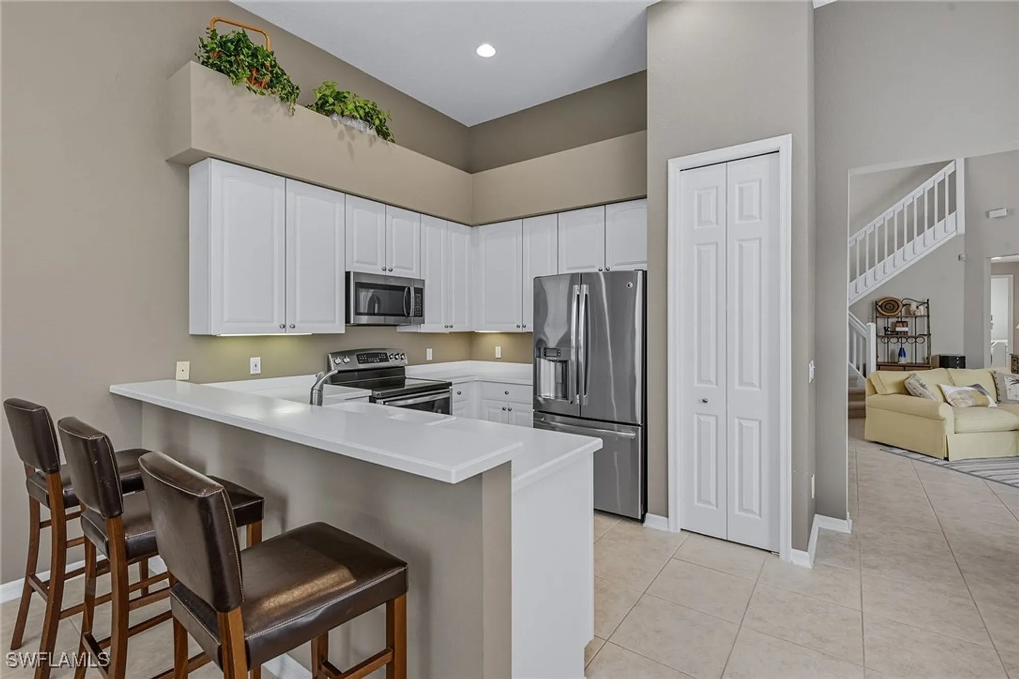 Property Slideshow image 10 of 49 | 8582 pepper tree way, Naples, FL, 34114