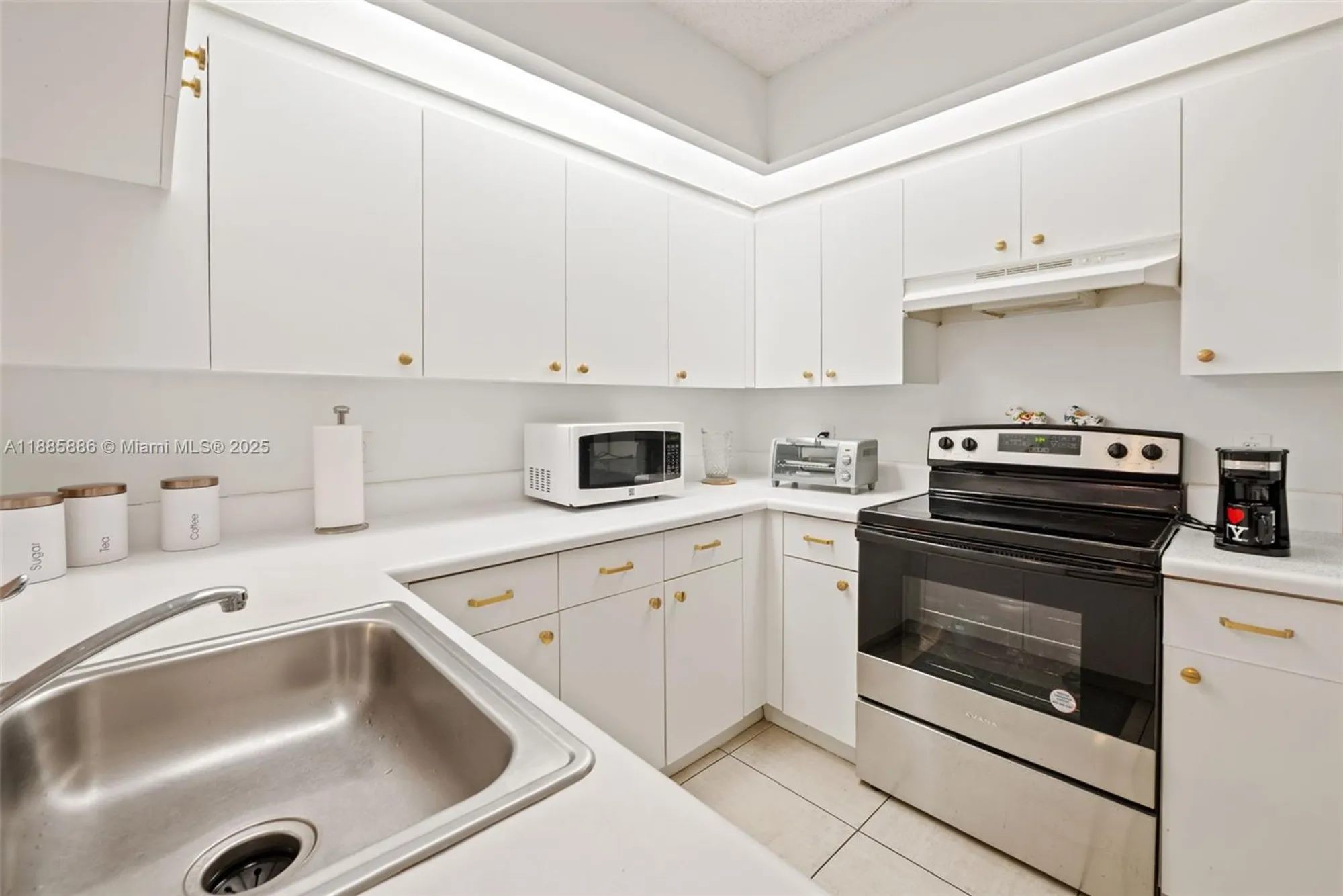 Property Slideshow image 15 of 25 | 701 sw 142nd ave 110s, Pembroke Pines, FL, 33027