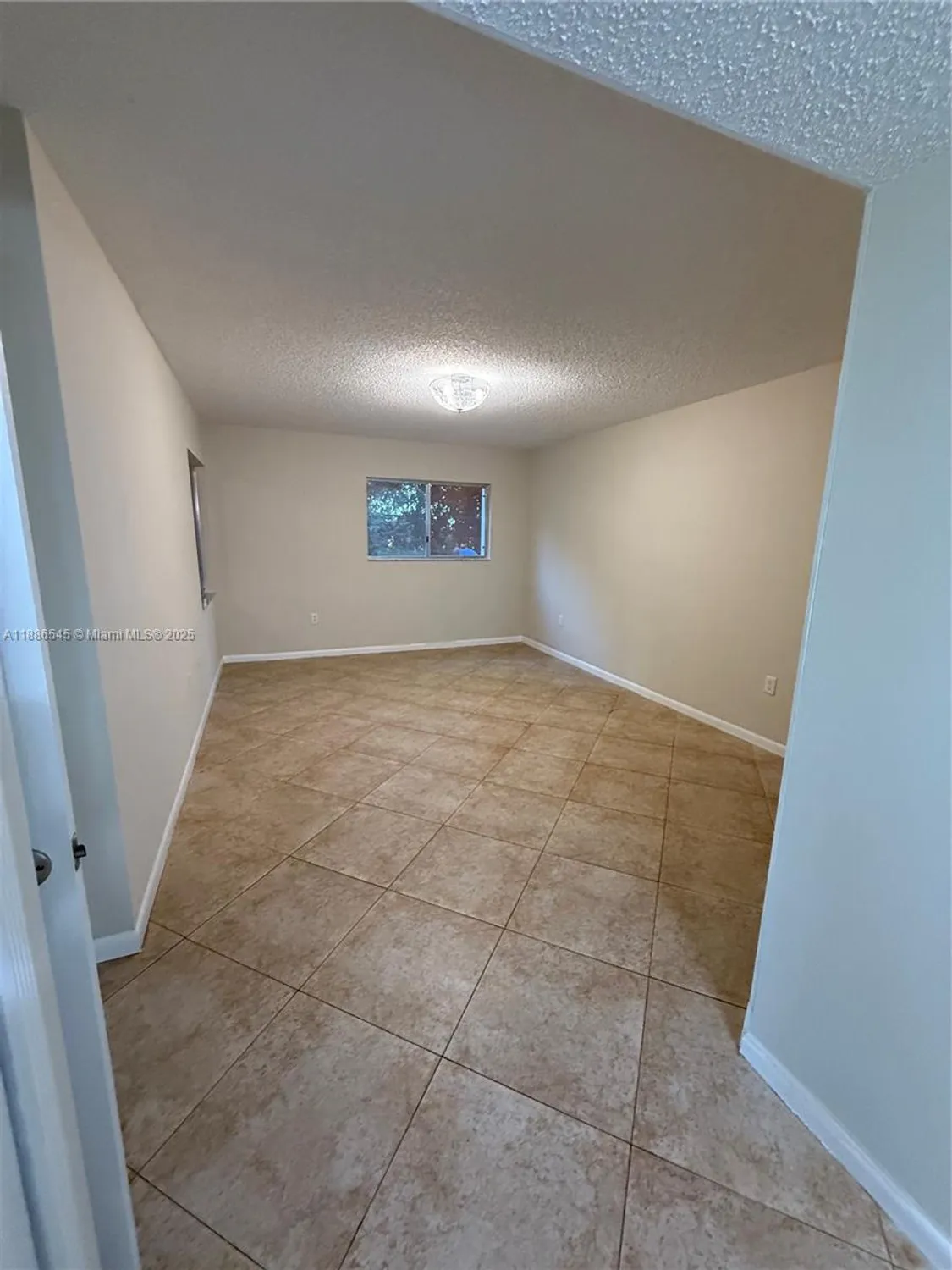 Property Slideshow image 2 of 8 | 900 sw 142nd ave 101l, Pembroke Pines, FL, 33027