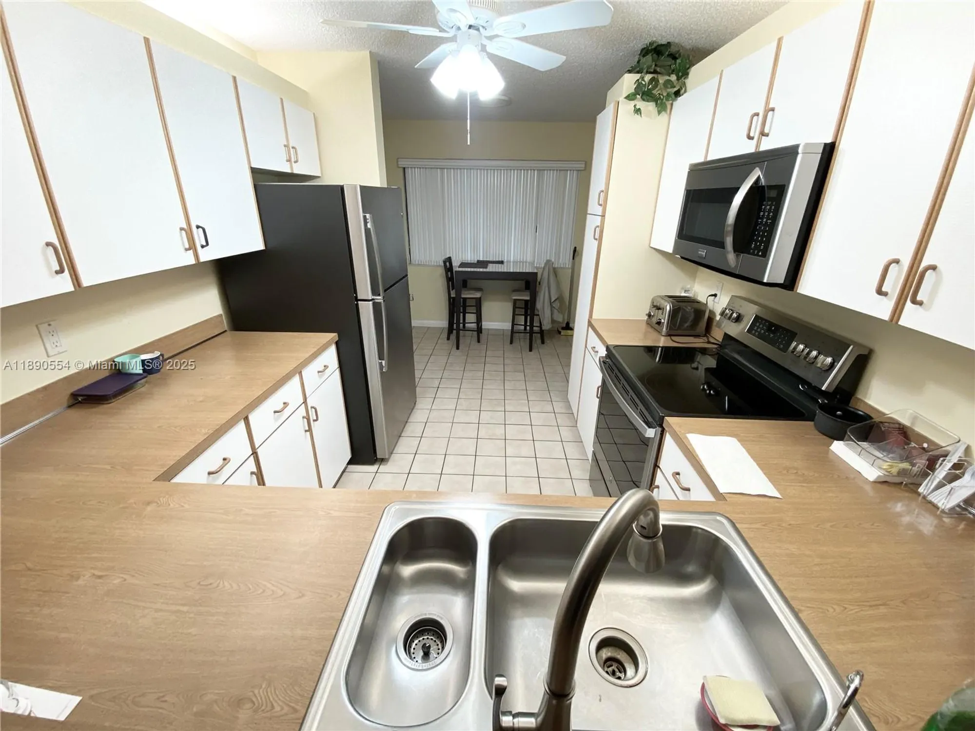 Property Slideshow image 11 of 36 | 10540 e clairmont cir 205, Tamarac, FL, 33321