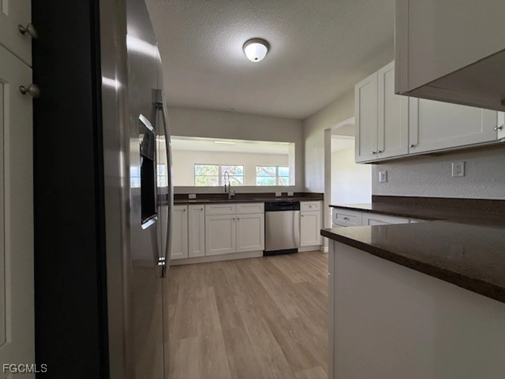 Property Slideshow image 4 of 34 | 4840 golf club ct 10, North Fort Myers, FL, 33903