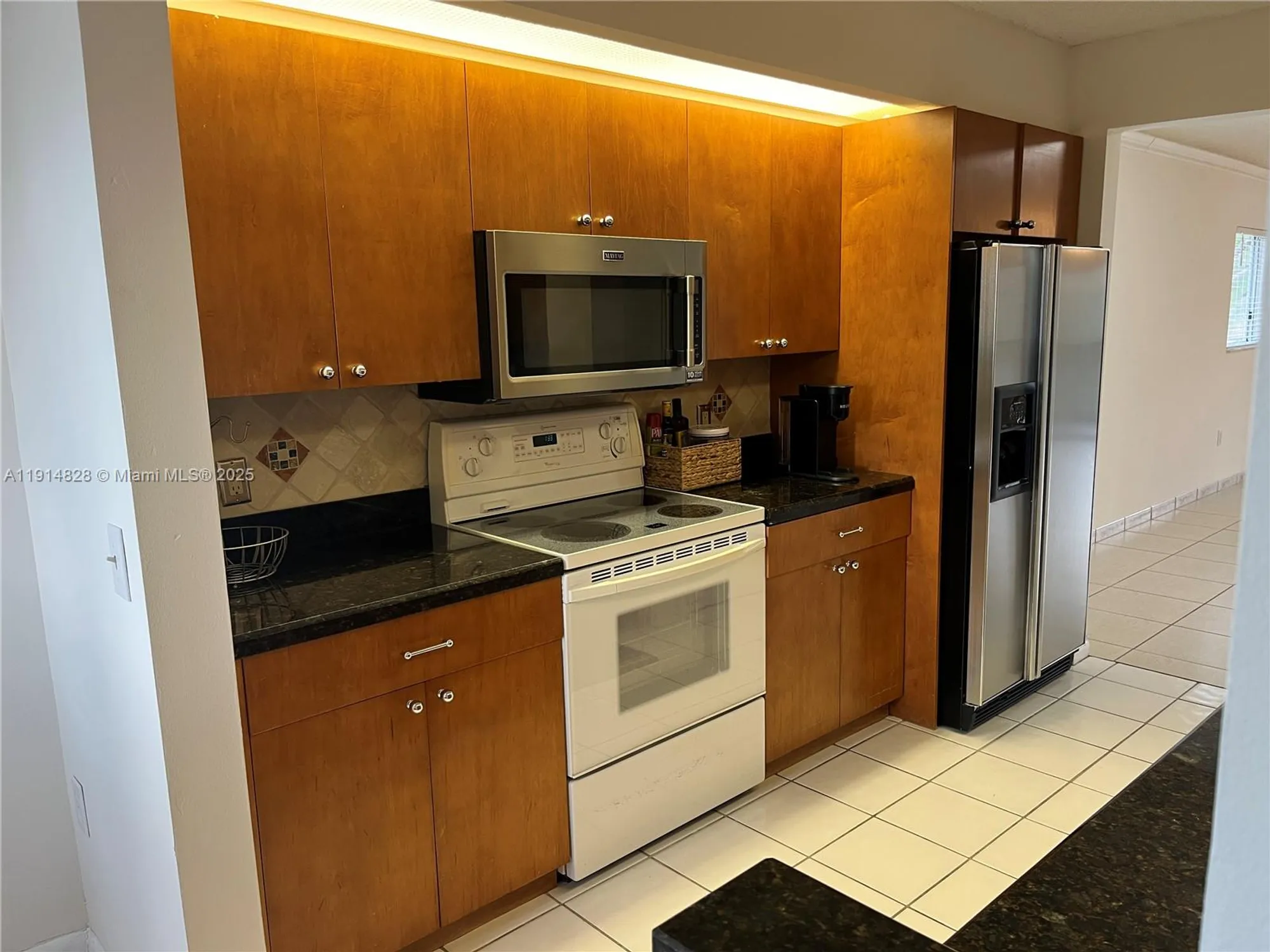 Property Slideshow image 3 of 32 | 1301 sw 142nd ave 301h, Pembroke Pines, FL, 33027