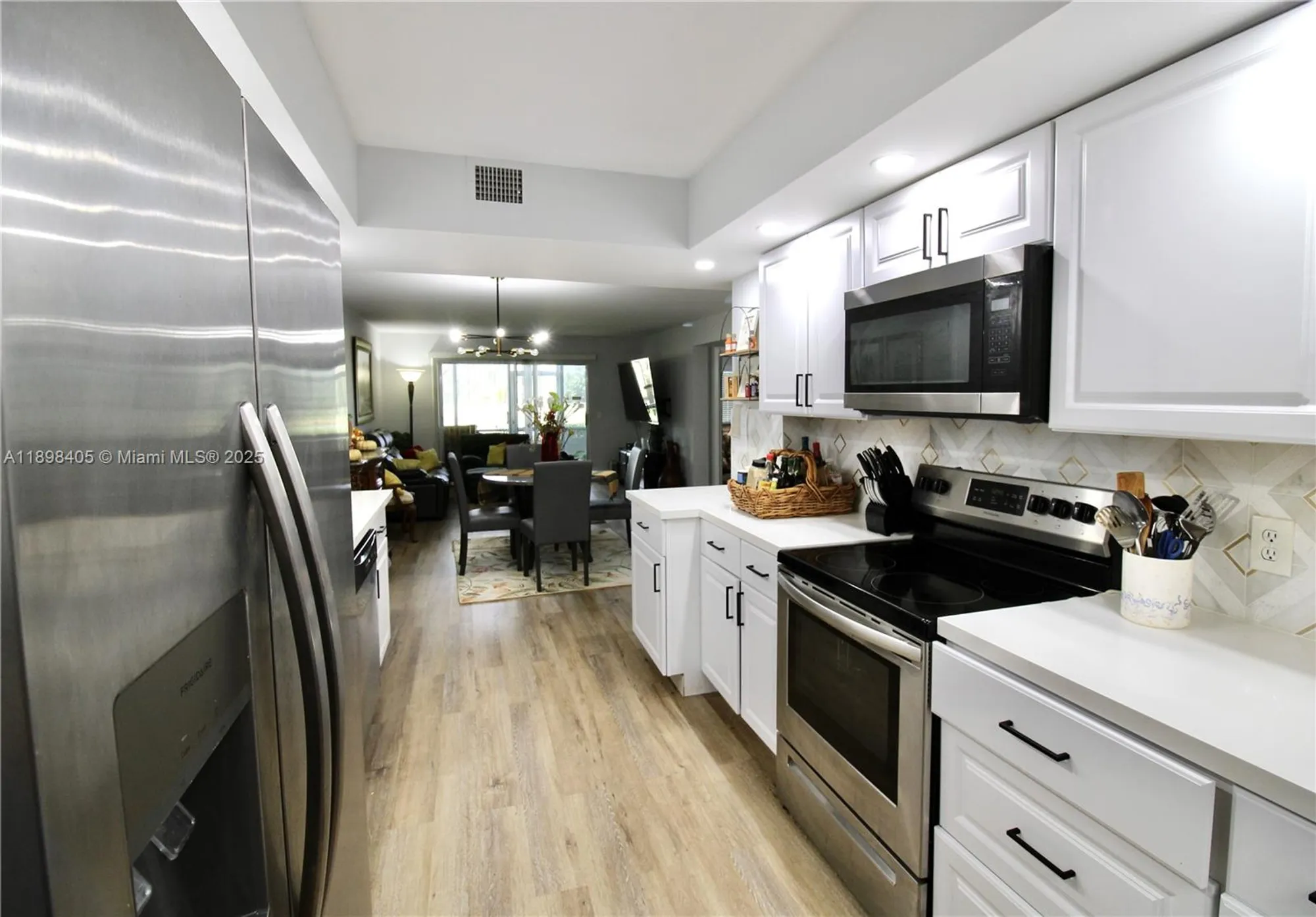 Property Slideshow image 1 of 27 | 1200 sw 125th ave 105l, Pembroke Pines, FL, 33027