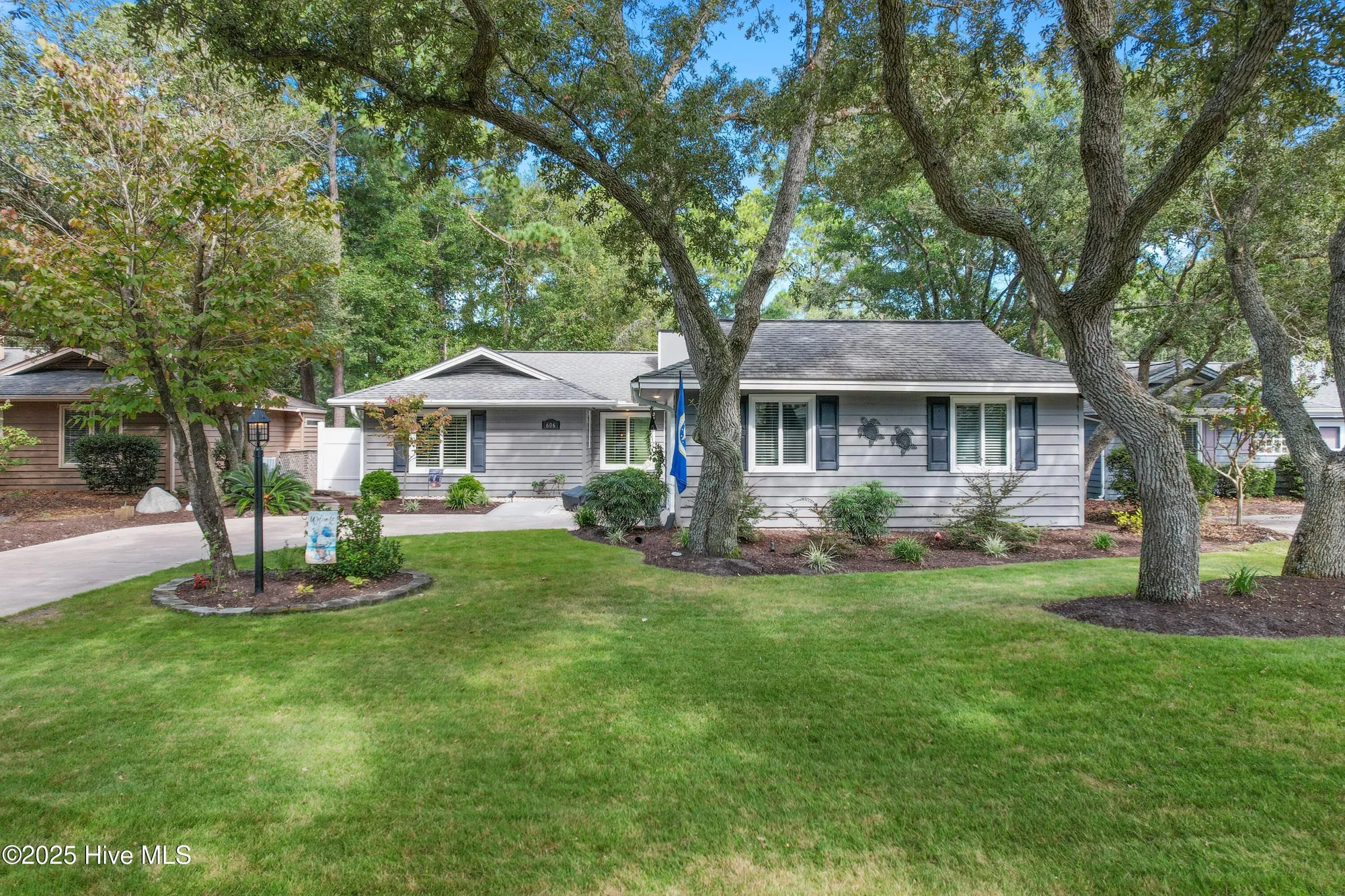 Property Slideshow image 1 of 64 | 606 camellia ln, Sunset Beach, NC, 28468