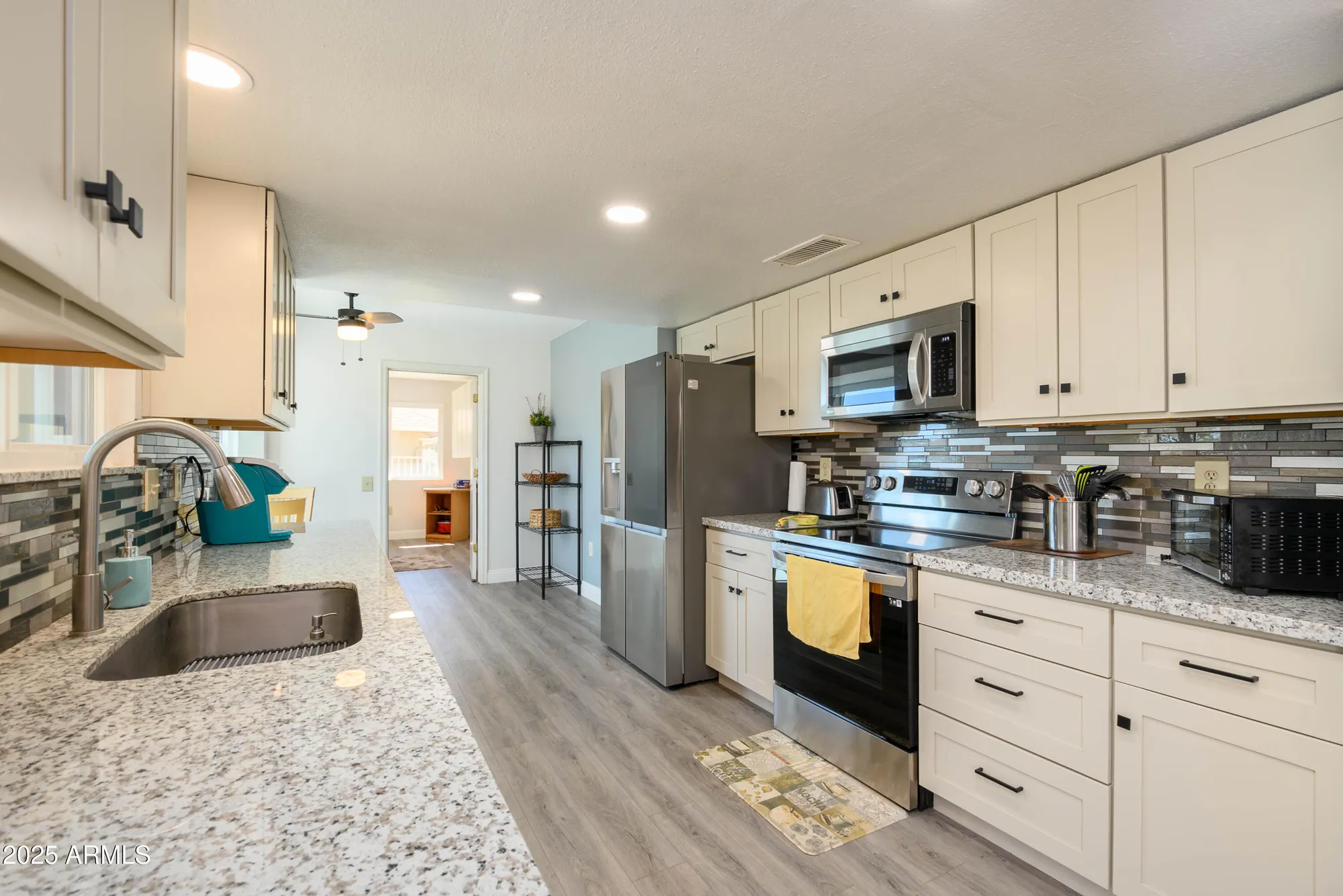 Property Slideshow image 11 of 29 | 21439 n palm desert dr, Sun City West, AZ, 85375