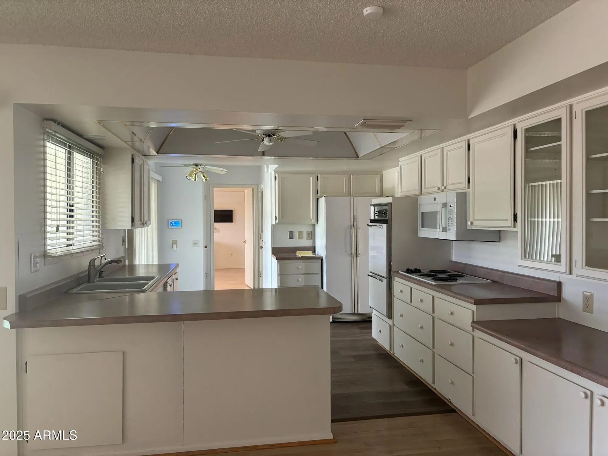 Property Slideshow image 11 of 31 | 9715 w wrangler dr, Sun City, AZ, 85373