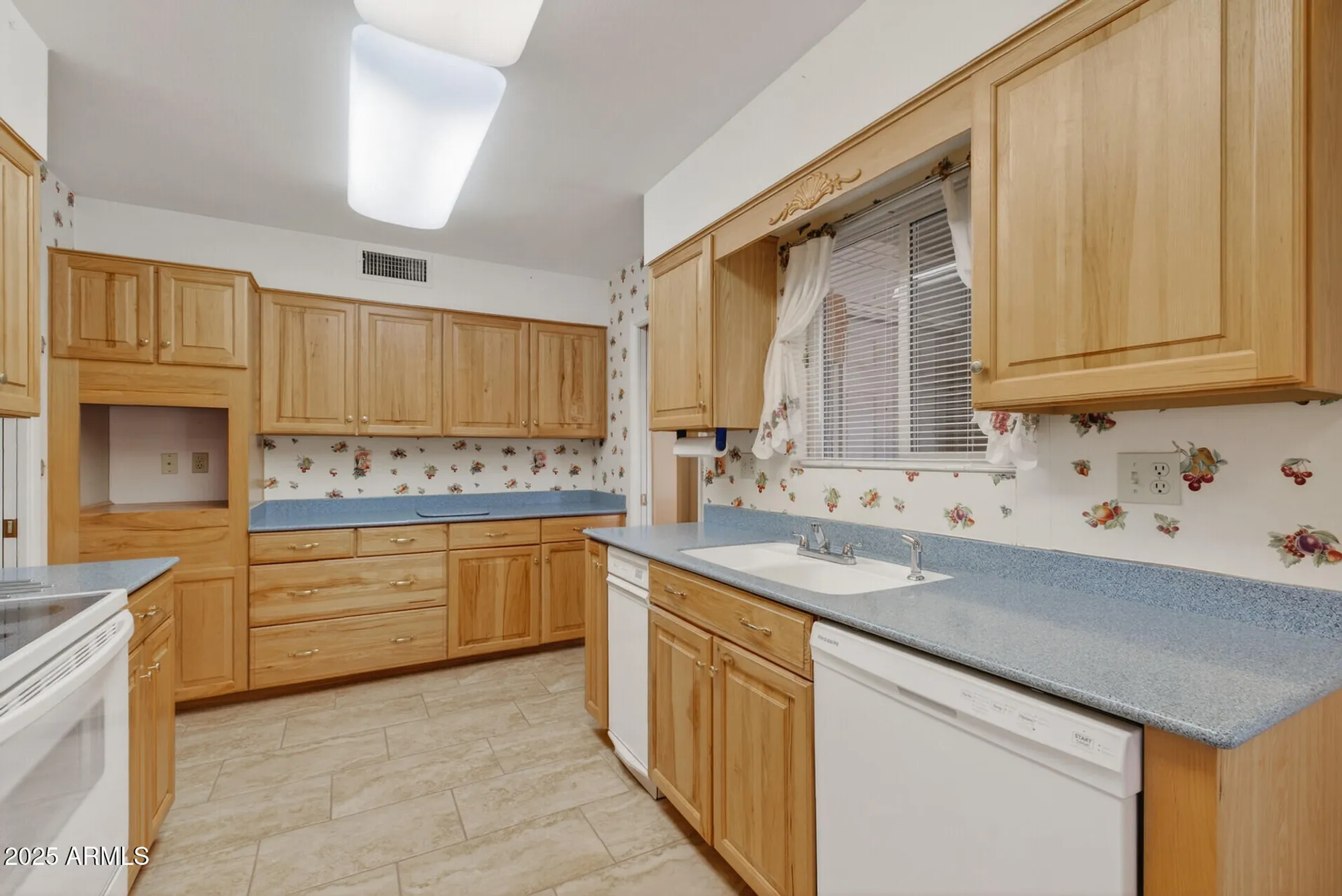 Property Slideshow image 12 of 27 | 10801 w mountain view rd, Sun City, AZ, 85351