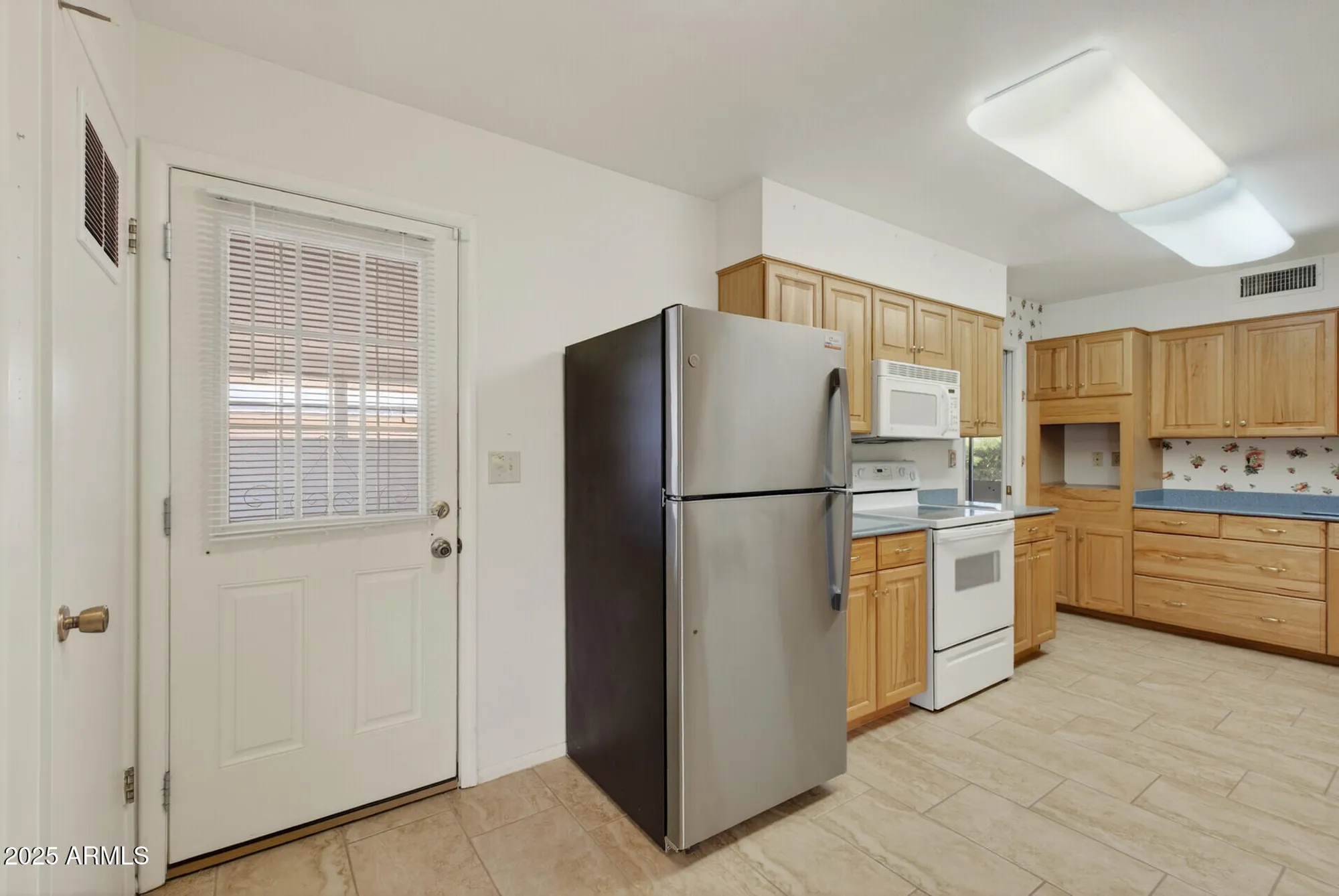 Property Slideshow image 16 of 27 | 10801 w mountain view rd, Sun City, AZ, 85351
