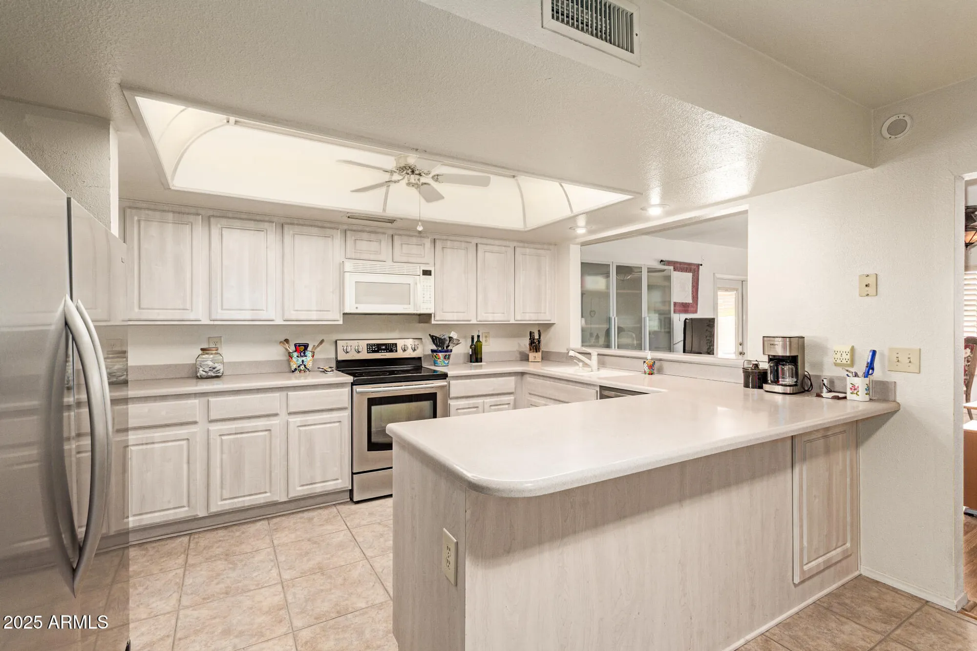 Property Slideshow image 9 of 38 | 10521 e flintlock dr, Sun Lakes, AZ, 85248