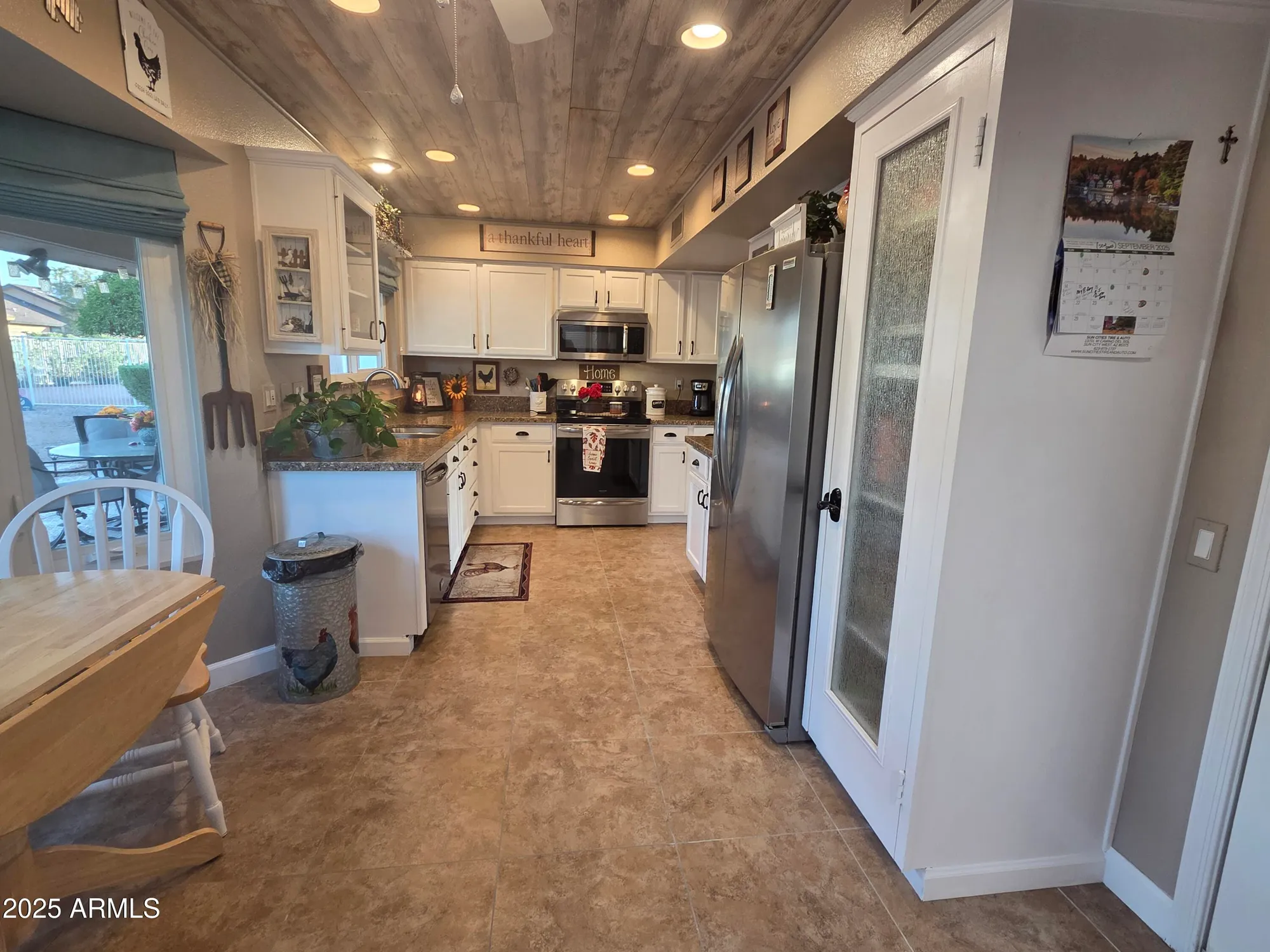 Property Slideshow image 11 of 55 | 19814 n white rock dr, Sun City West, AZ, 85375