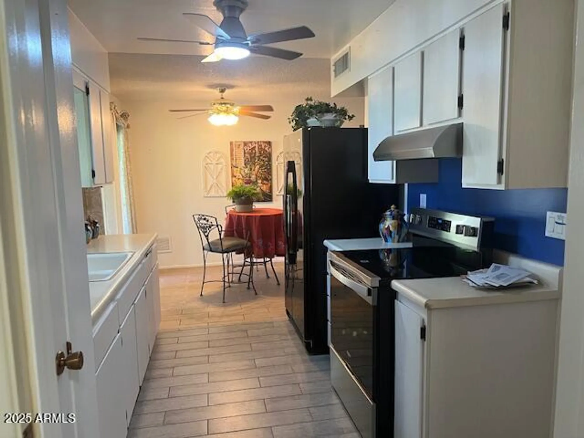 Property Slideshow image 7 of 17 | 10758 w cinnebar ave, Sun City, AZ, 85351