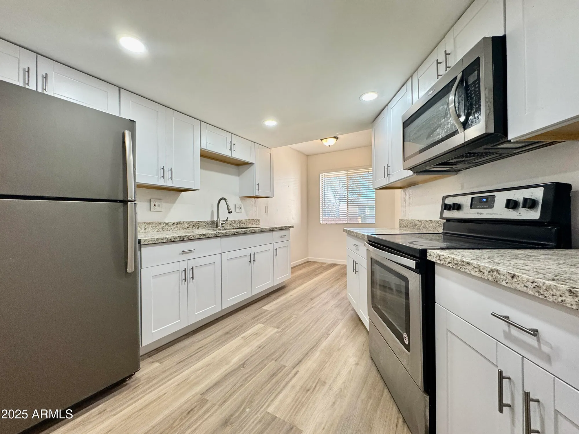 Property Slideshow image 1 of 9 | 10949 w coggins dr, Sun City, AZ, 85351