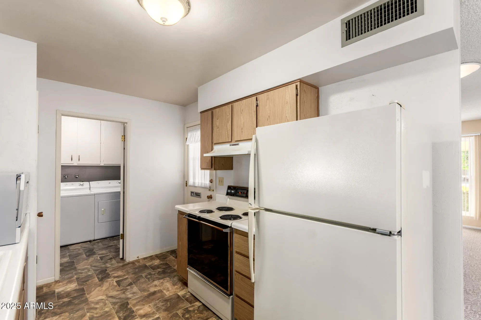 Property Slideshow image 10 of 28 | 10754 w cinnebar ave, Sun City, AZ, 85351