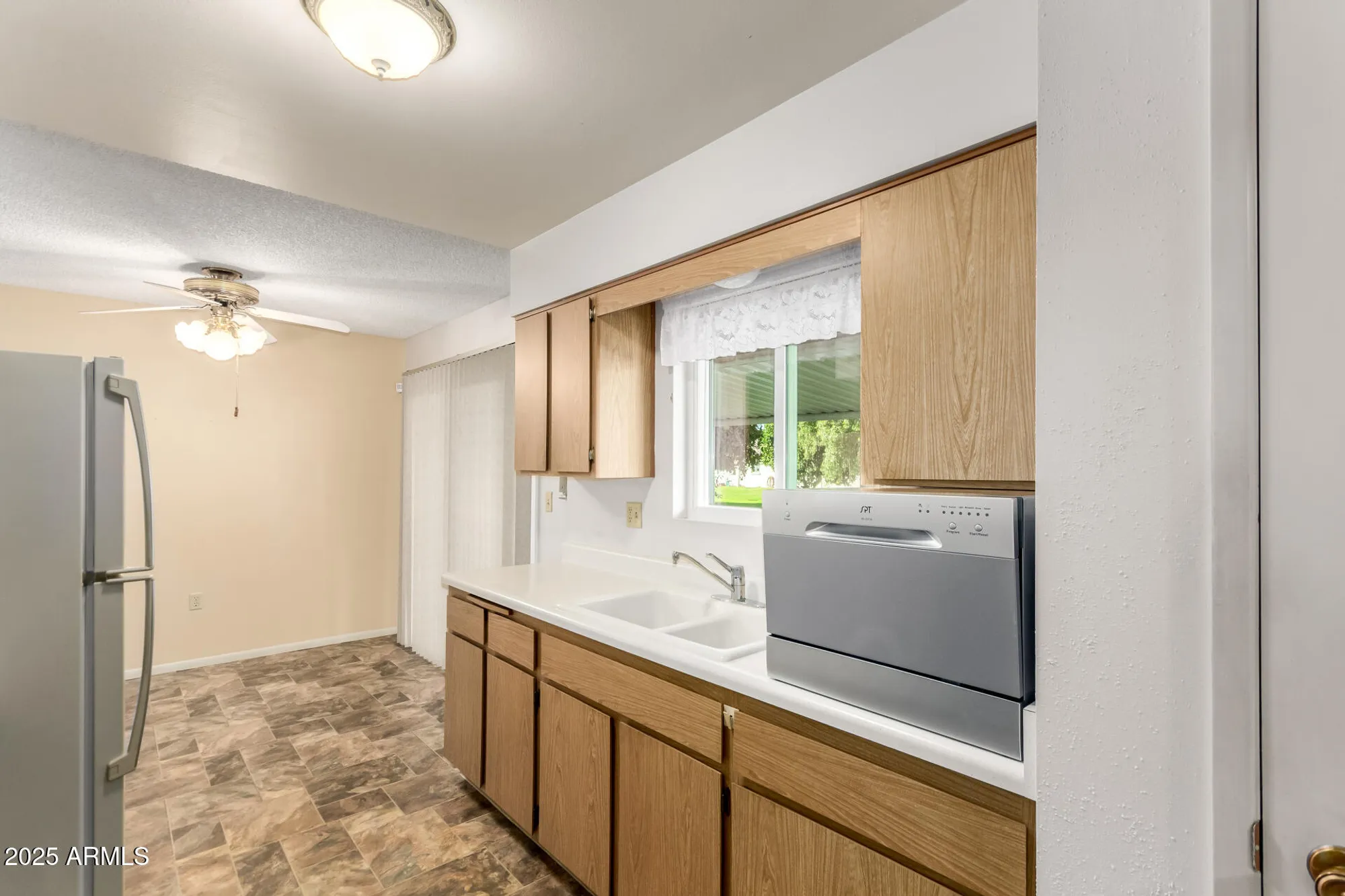 Property Slideshow image 11 of 28 | 10754 w cinnebar ave, Sun City, AZ, 85351