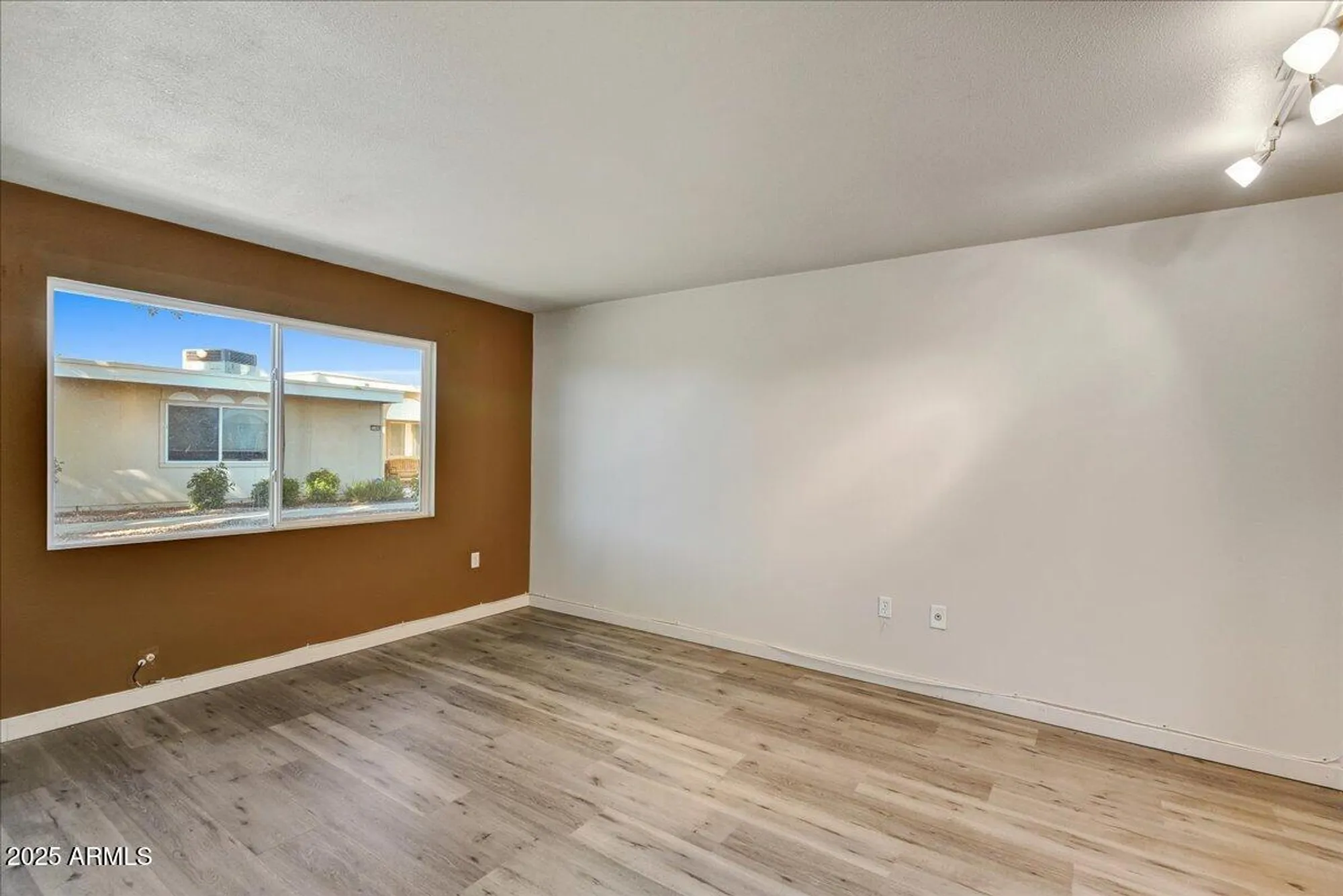 Property Slideshow image 11 of 15 | 11061 w coggins dr, Sun City, AZ, 85351