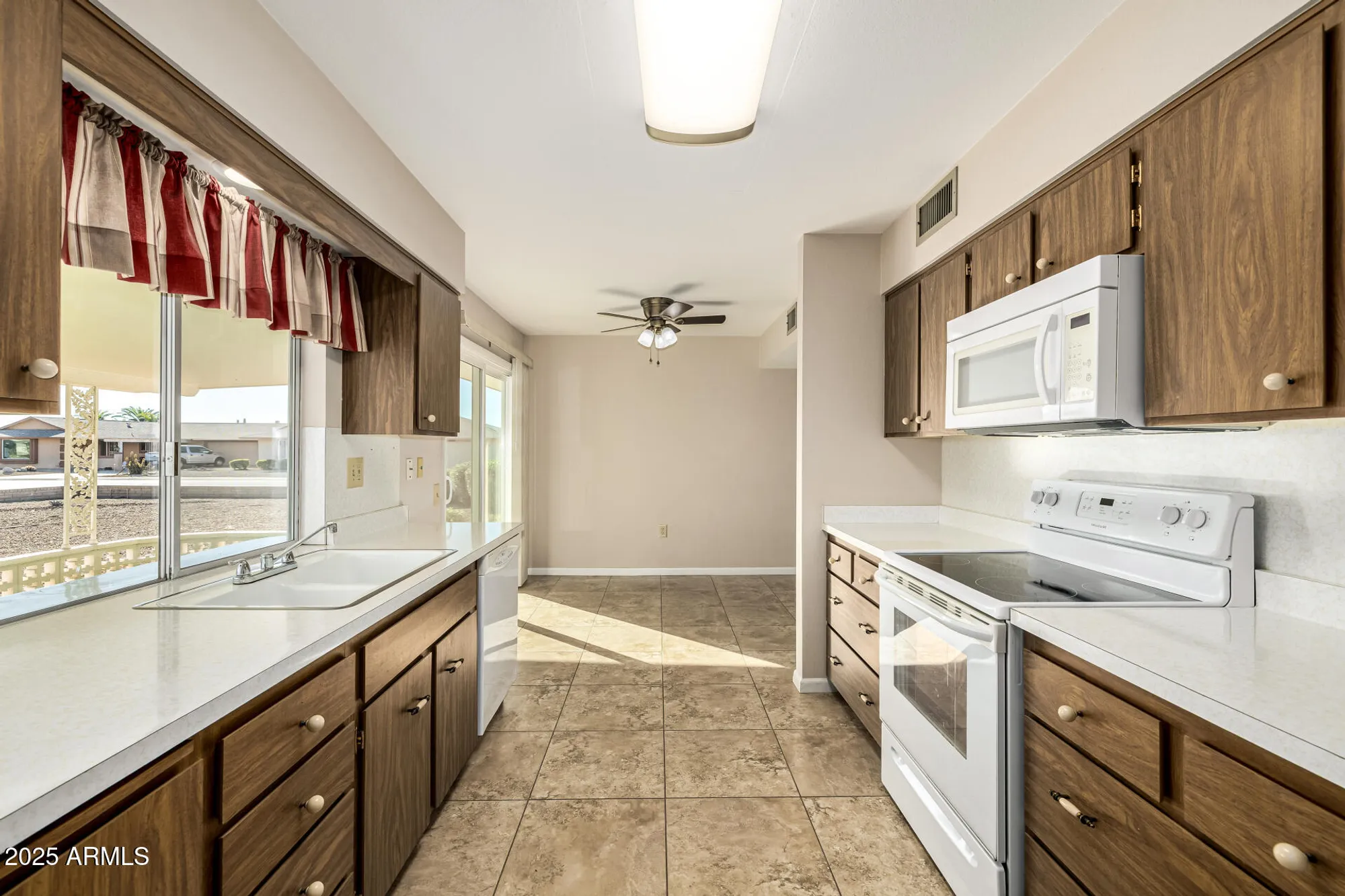 Property Slideshow image 5 of 34 | 10461 w sutters gold ln, Sun City, AZ, 85351