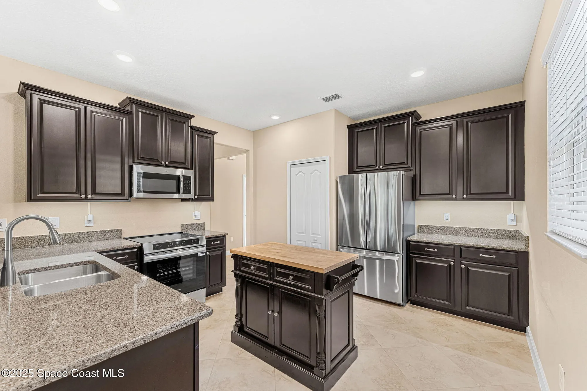 Property Slideshow image 7 of 34 | 6488 van ness dr, Melbourne, FL, 32940
