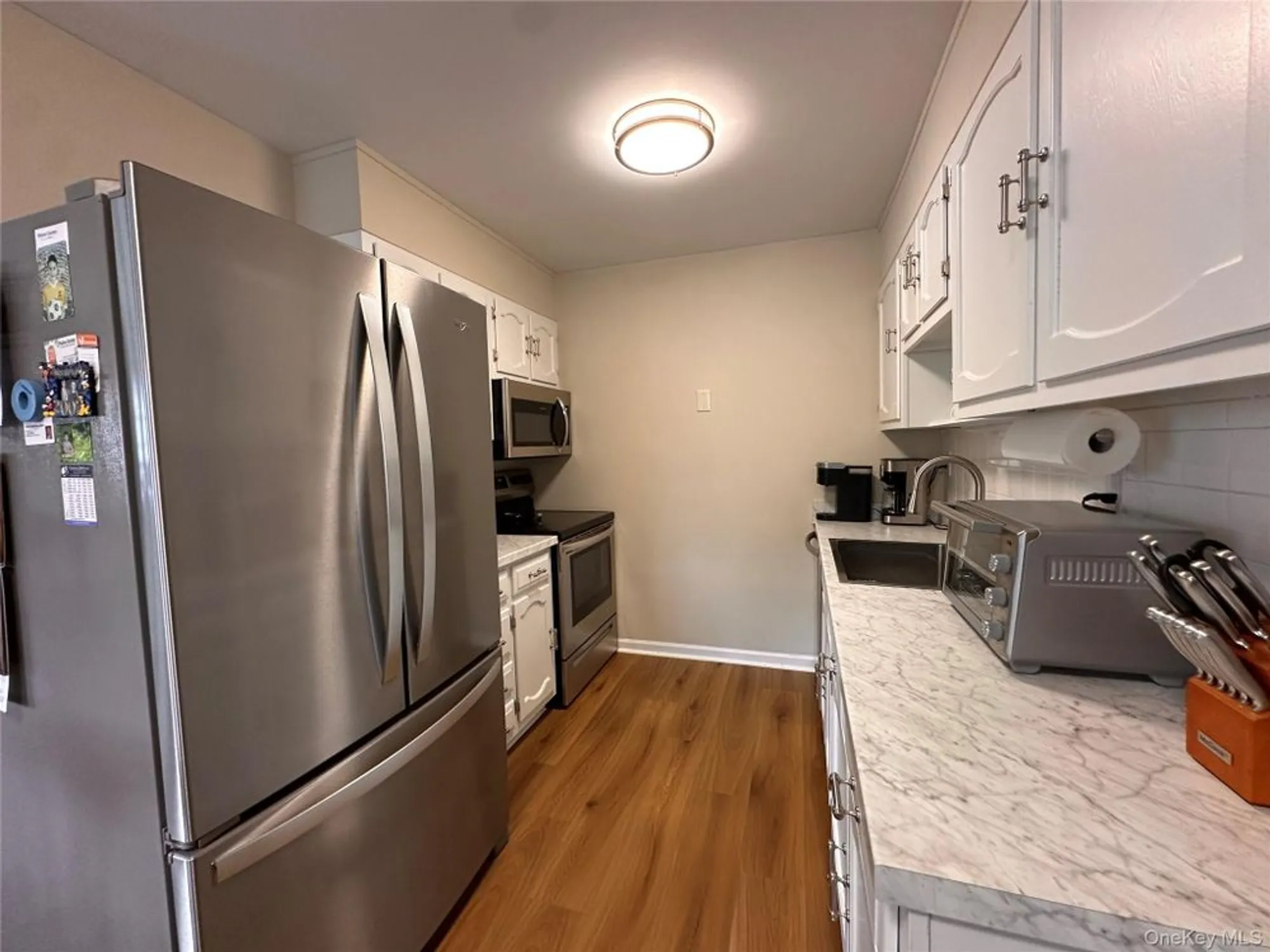 Property Slideshow image 11 of 18 | 276 berwick ct a, Ridge, NY, 11961