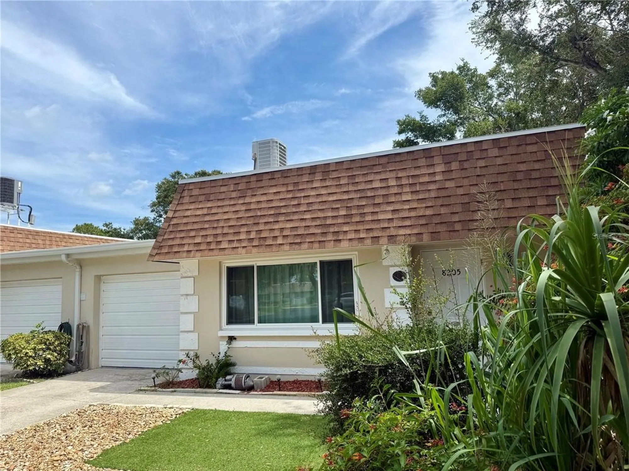 Property Slideshow image 1 of 21 | 8205 burgundy dr n # 8205, Pinellas Park, FL, 33781