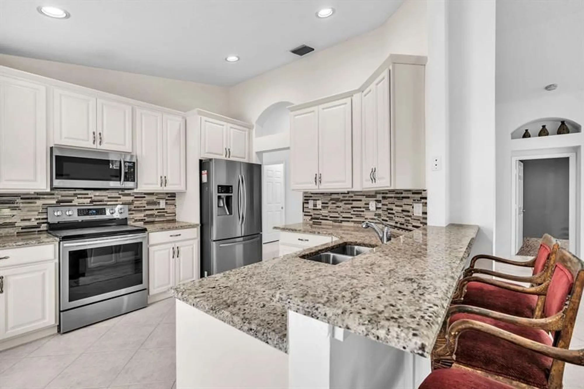 Property Slideshow image 3 of 57 | 5701 swaying palm ln, Boynton Beach, FL, 33437