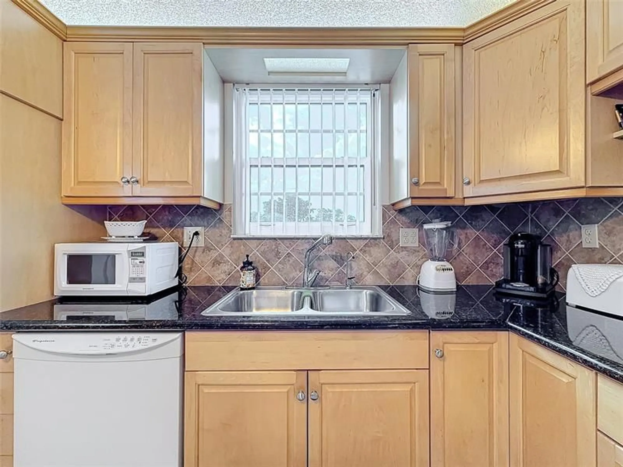 Property Slideshow image 14 of 62 | 4930 e sabal palm blvd 301, Tamarac, FL, 33319