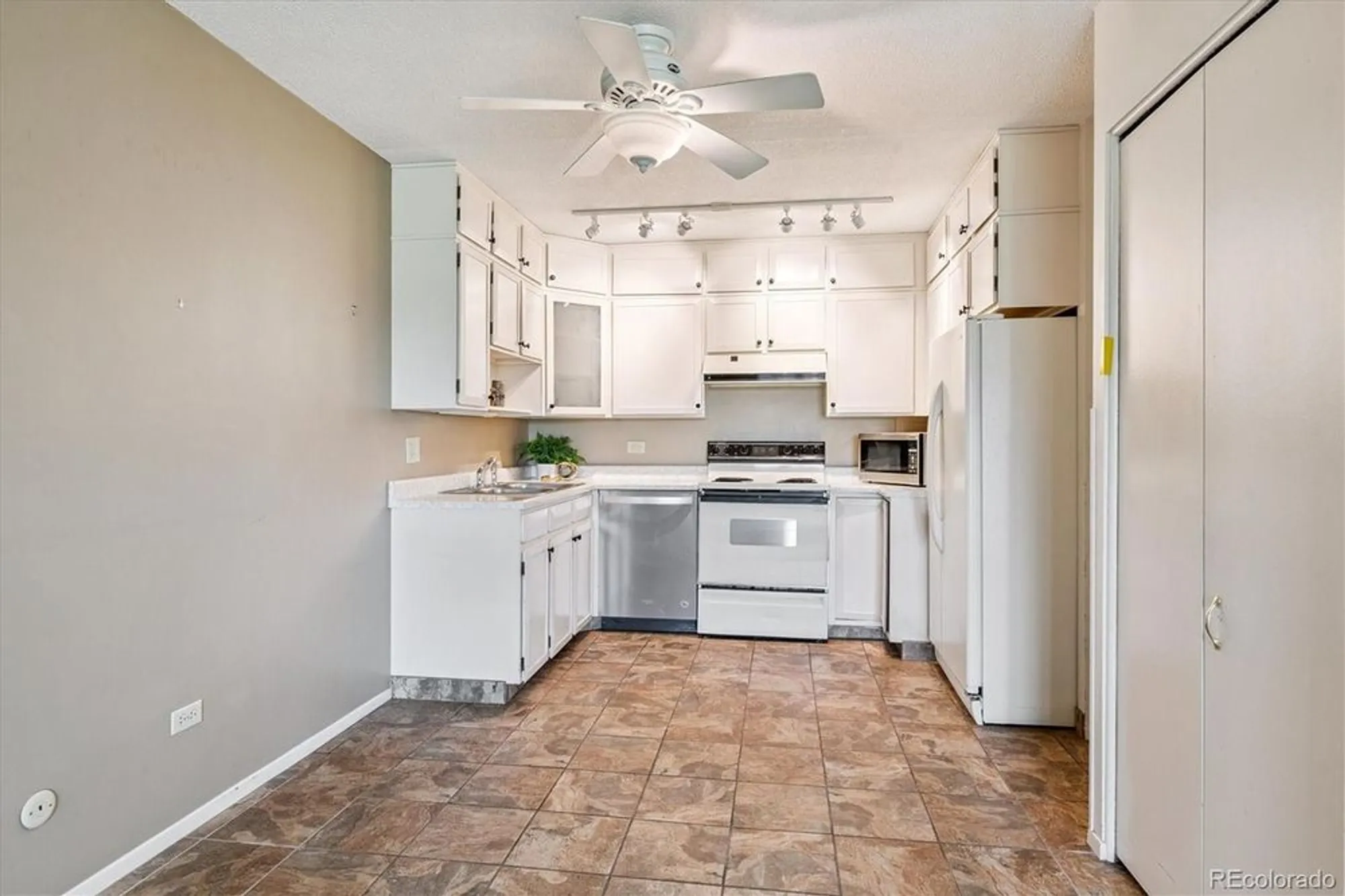 Property Slideshow image 8 of 50 | 9180 e center ave 4c, Denver, CO, 80247