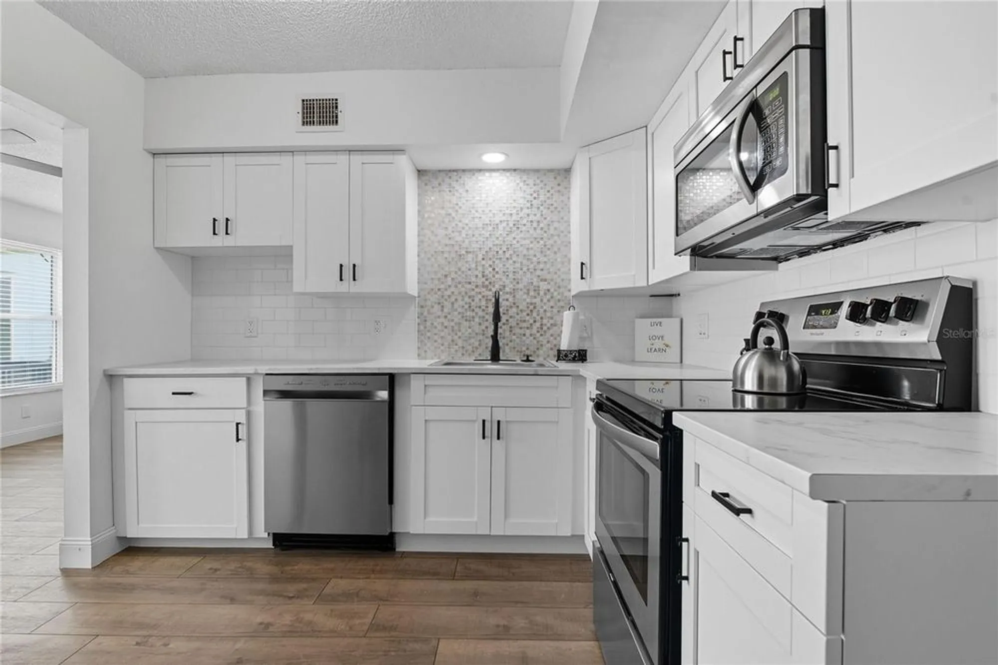 Property Slideshow image 8 of 40 | 2257 world parkway blvd 61, Clearwater, FL, 33763