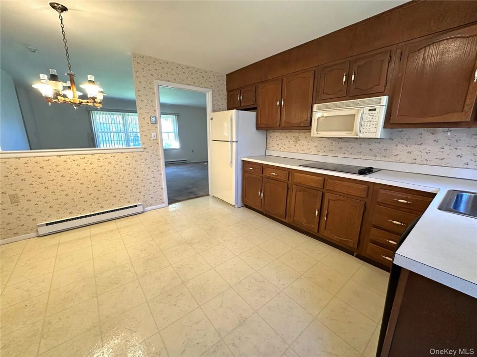 Property Slideshow image 6 of 15 | 215 woodbridge dr a, Ridge, NY, 11961