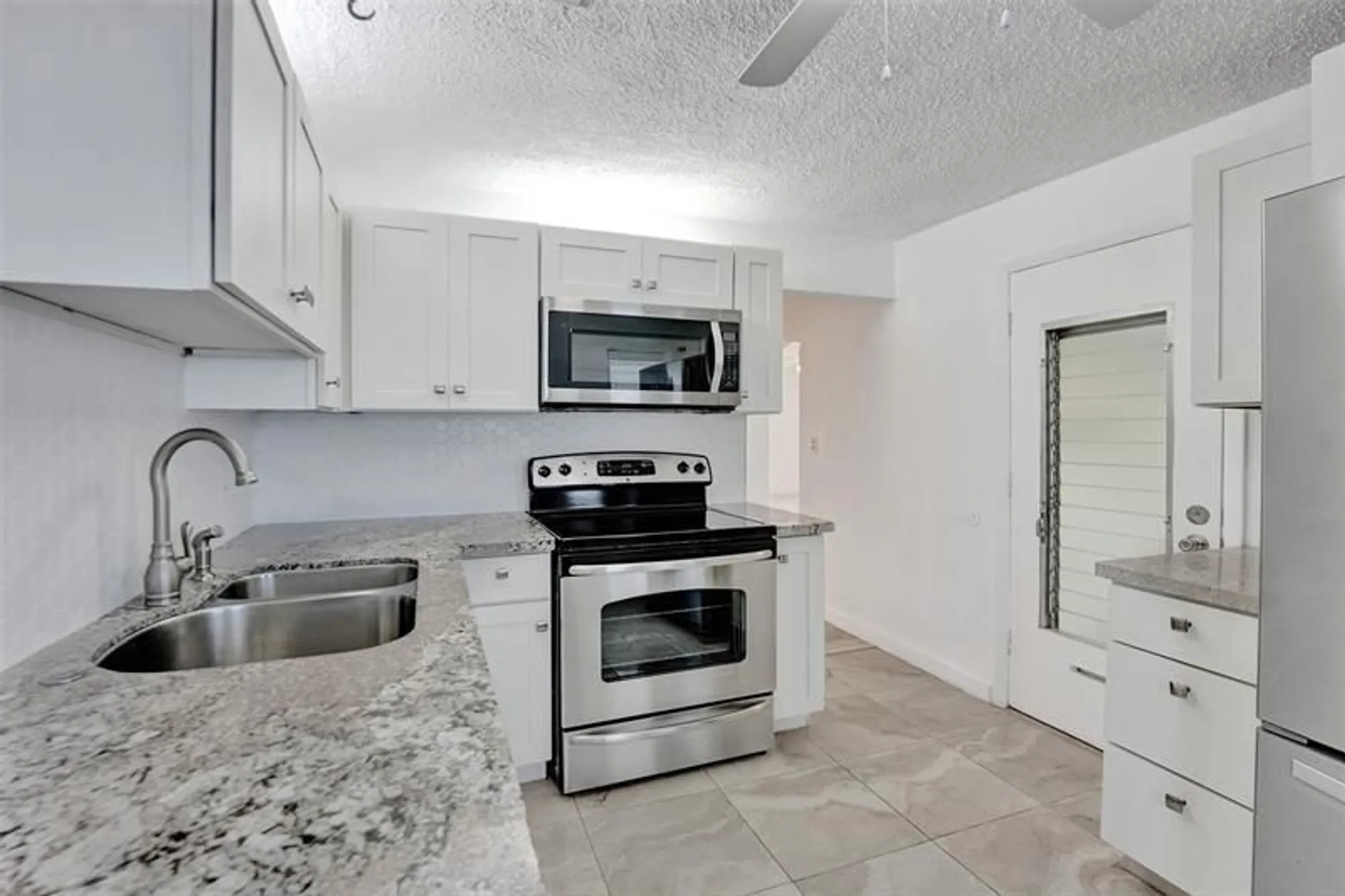 Property Slideshow image 9 of 17 | 340 nw 25th ct, Pompano Beach, FL, 33064