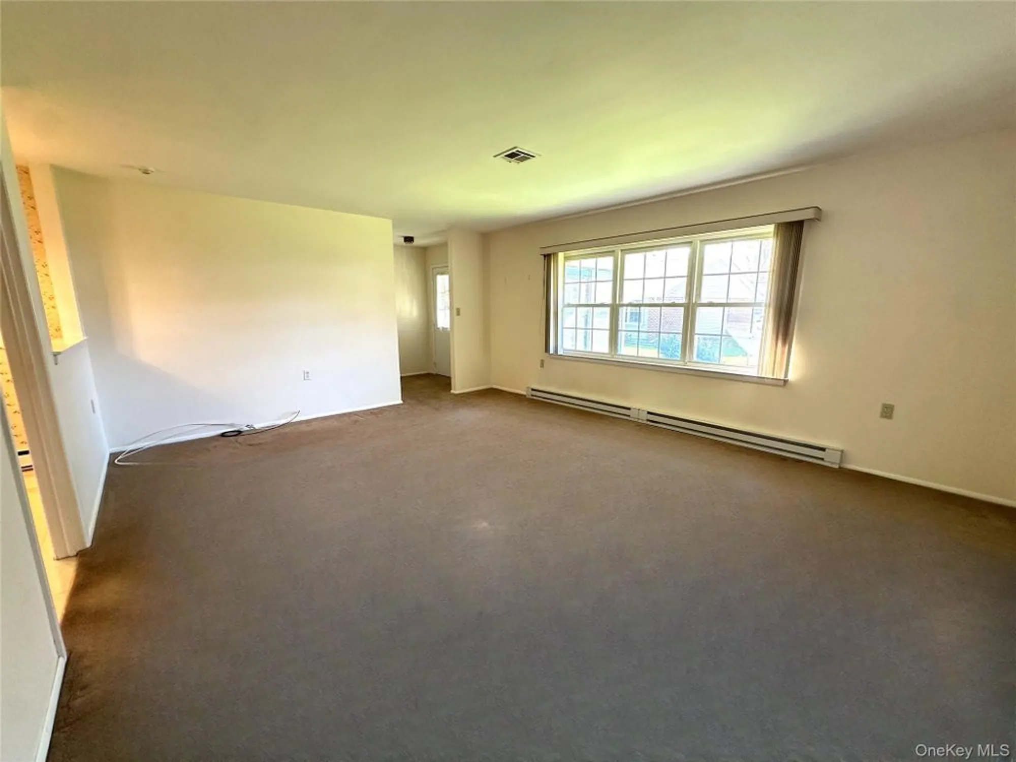 Property Slideshow image 5 of 15 | 215 woodbridge dr a, Ridge, NY, 11961