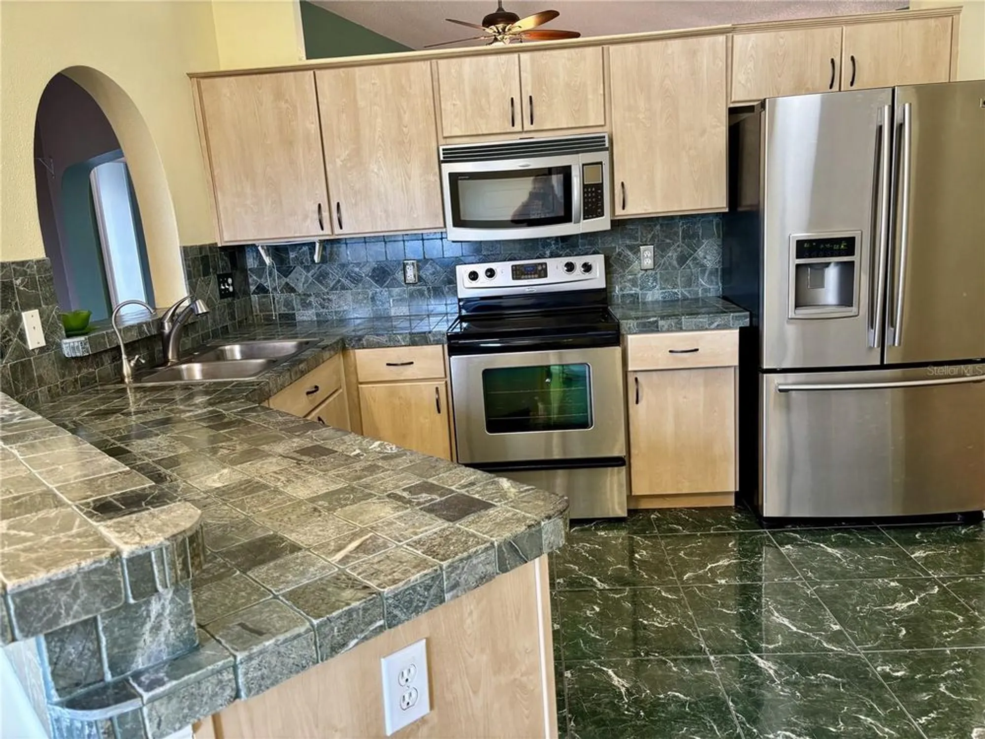 Property Slideshow image 12 of 47 | 301 caloosa palms ct, Sun City Center, FL, 33573